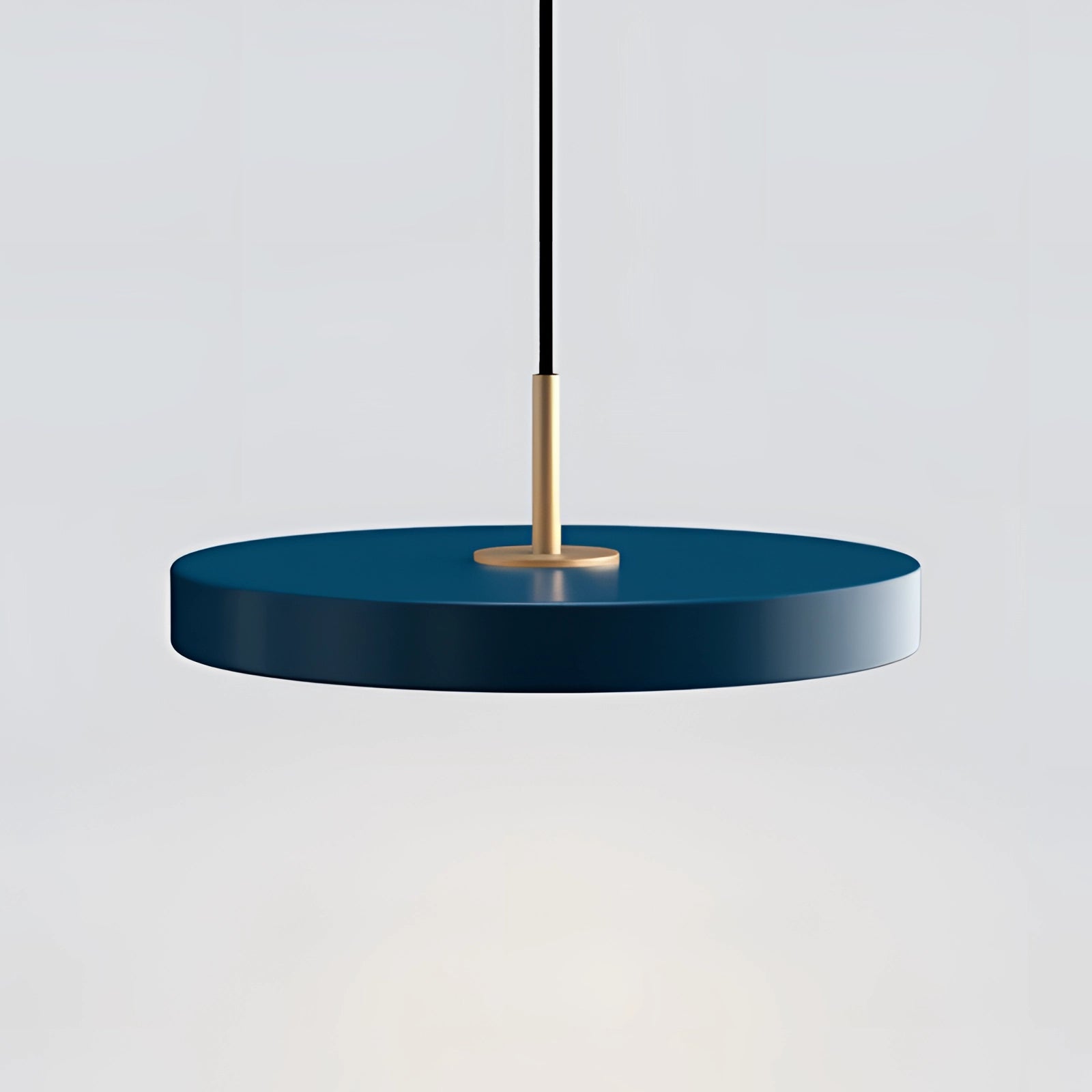 Suspended round dining table with a minimalist design in a striking blue and cold white color scheme.