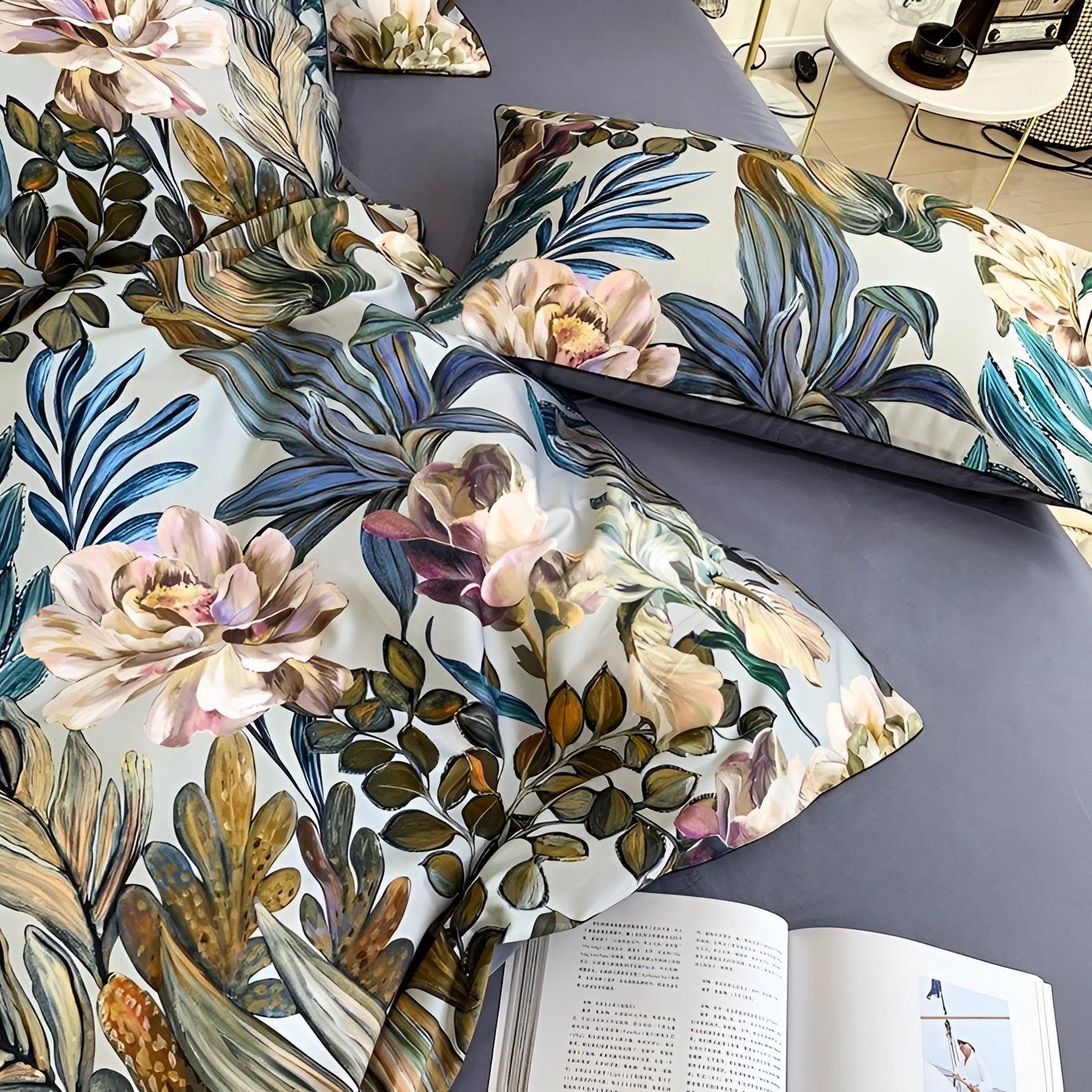 Floral bedding set featuring a tropical botanical duvet cover with vibrant floral patterns and satin pillowcases, showcasing intricate plant and petal designs.