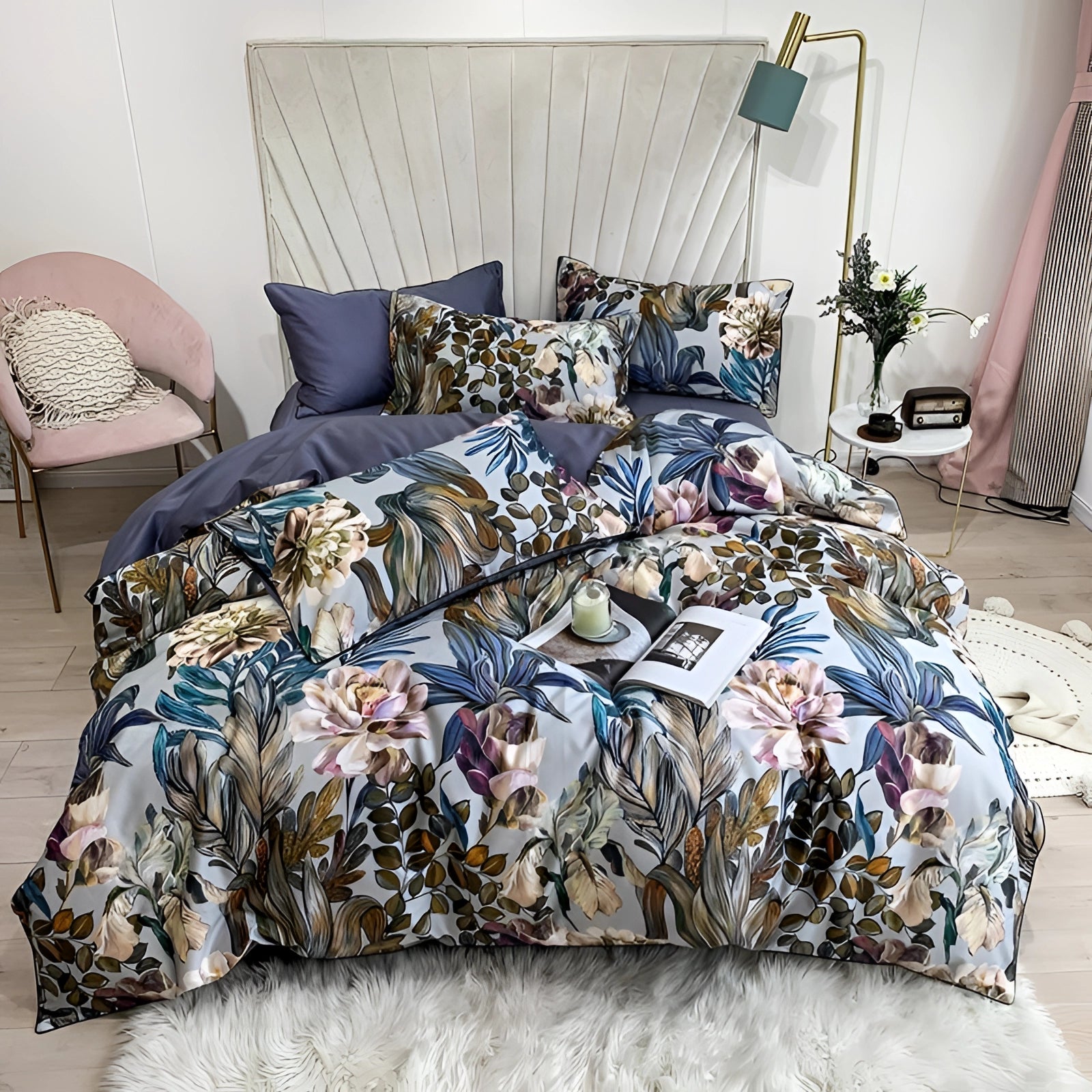 Tropical botanical floral bedding set in a California King size displayed on a wooden bed frame, featuring a vibrant azure and green plant pattern duvet cover and matching satin pillowcases in a well-designed interior bedroom with wooden flooring.