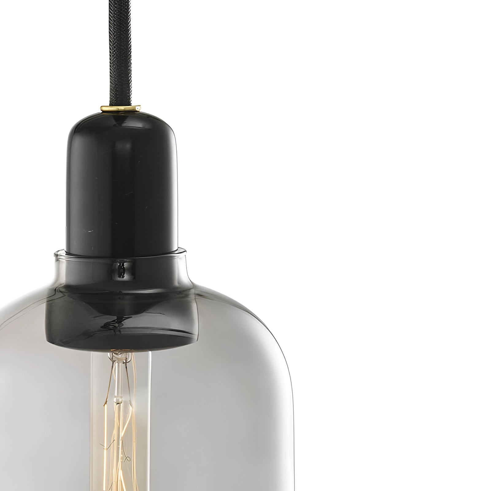 Frosted glass pendant light with a brass fixture, designed in a Scandinavian minimalist style, featuring a sleek cylindrical shape.