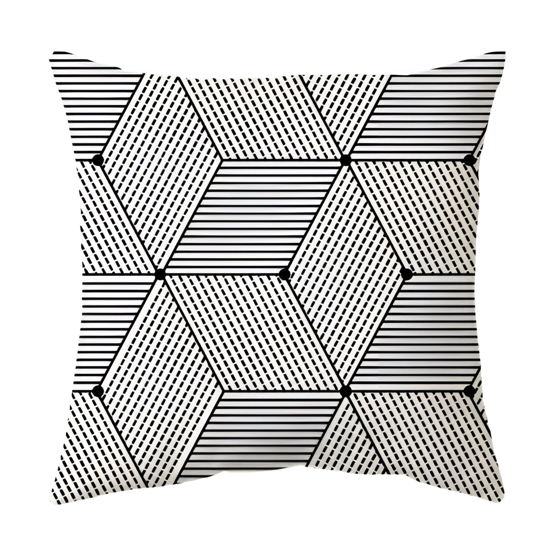 Modern geometric black and white pillow featuring an abstract pattern with symmetrical lines, triangles, and squares, measuring 60 x 60 cm.