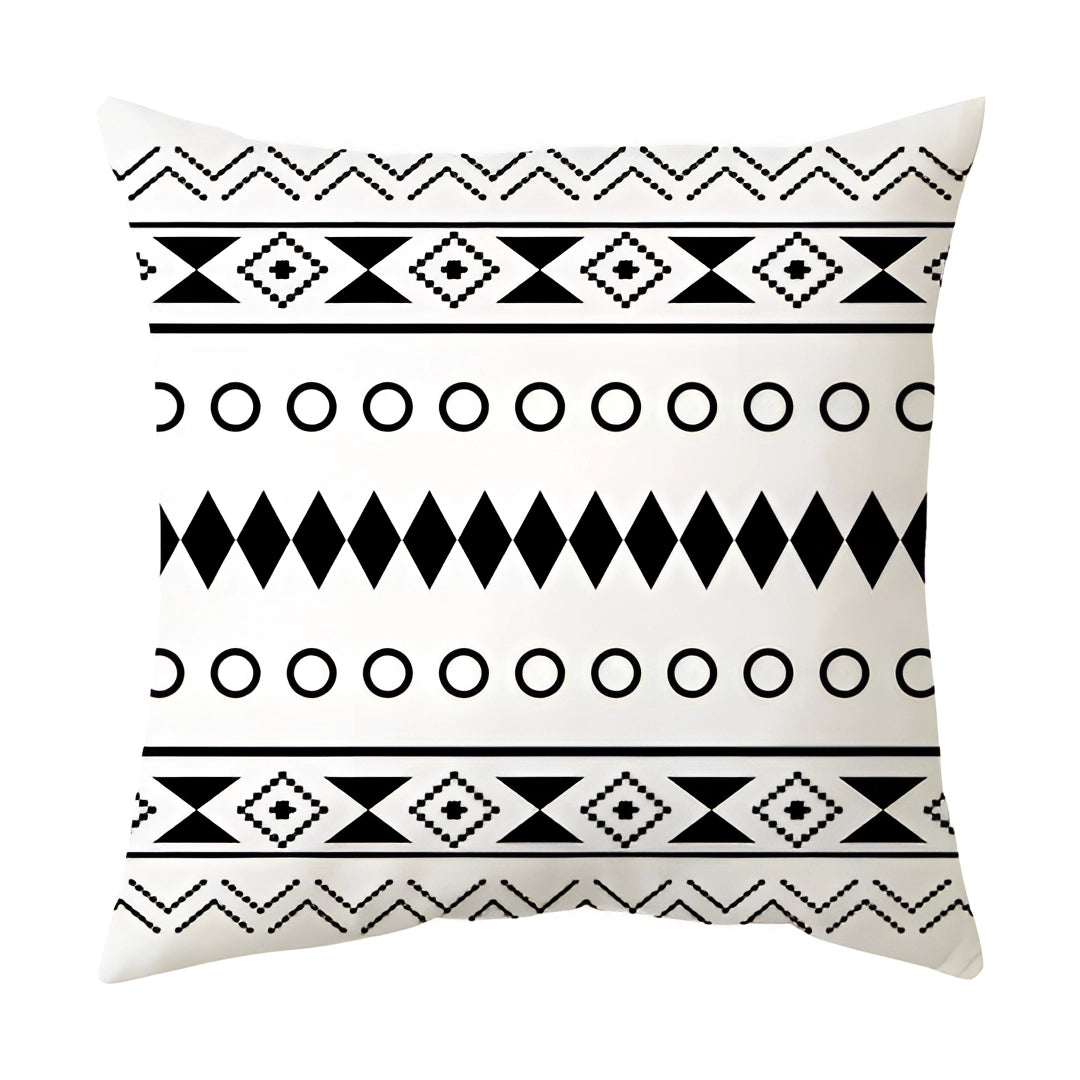 Geometric black and white pillow with modern abstract design featuring triangles, circles, and other geometric patterns, in a 60 x 60 cm size.