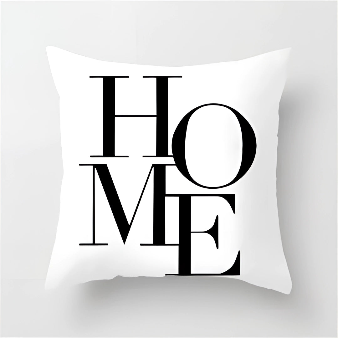 Geometric black and white throw pillow with modern abstract design, measuring 60 x 60 cm, featuring bold graphic patterns.