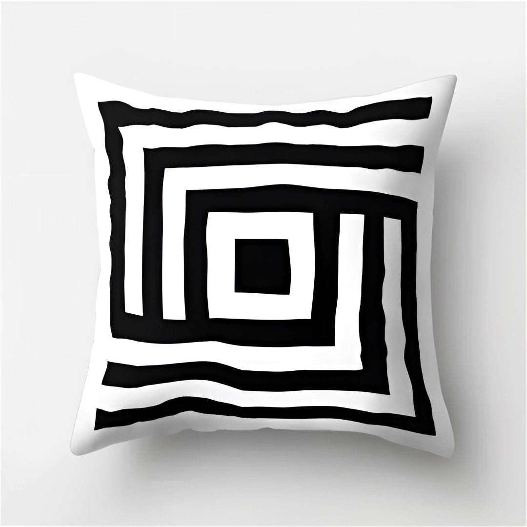 Geometric black and white throw pillow featuring a modern abstract pattern, designed as a rectangular accent cushion measuring 60 x 60 cm, ideal for contemporary home decor and bedding.