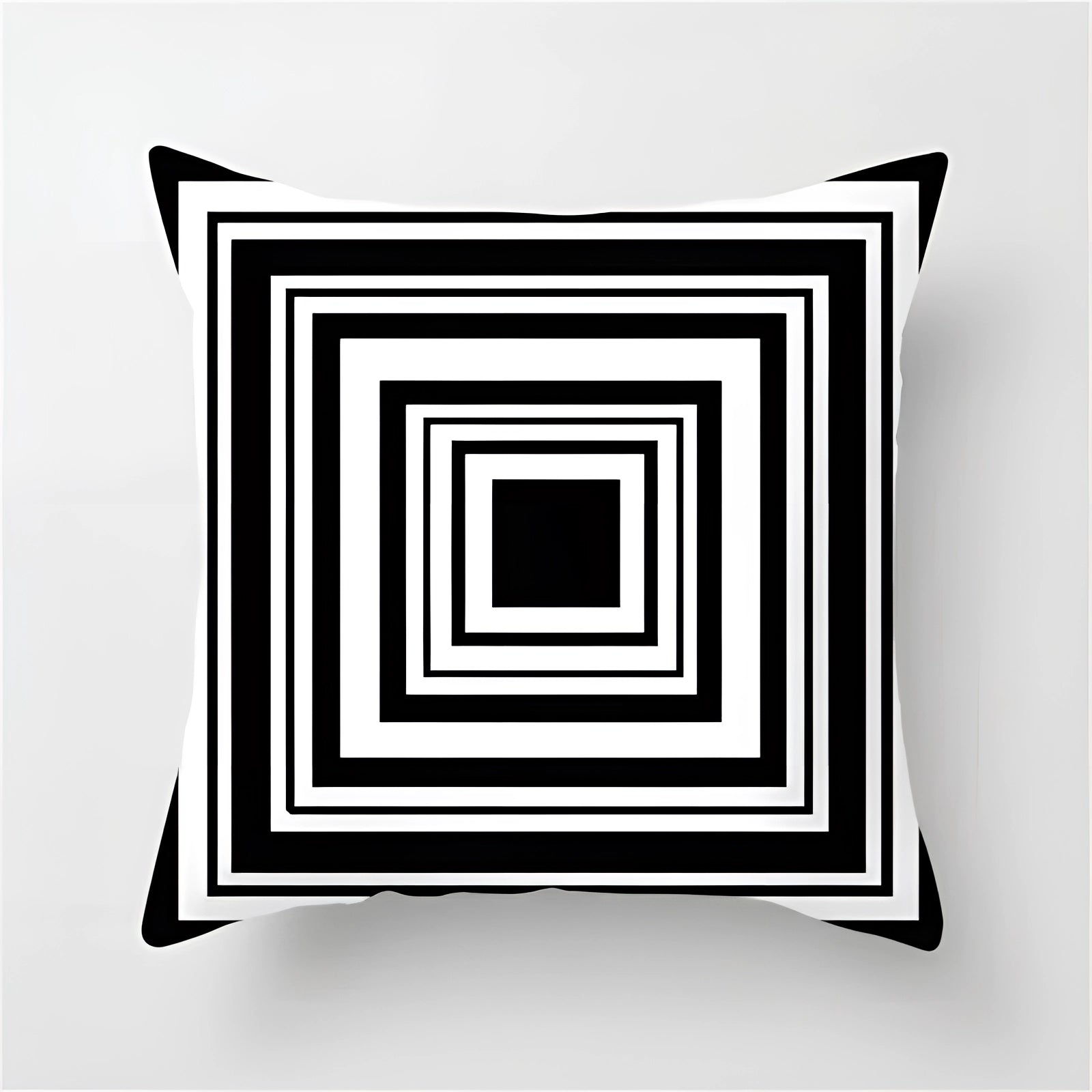 Geometric black and white pillow with a modern abstract design, featuring symmetrical patterns and a square shape, measuring 60 x 60 cm.