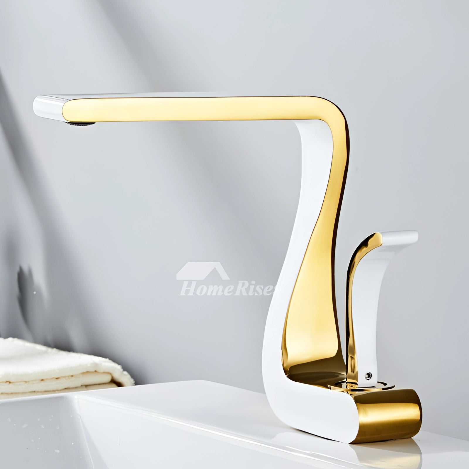 
Luxury modern square basin mixer tap in a white and gold finish, featuring a sleek and contemporary design.