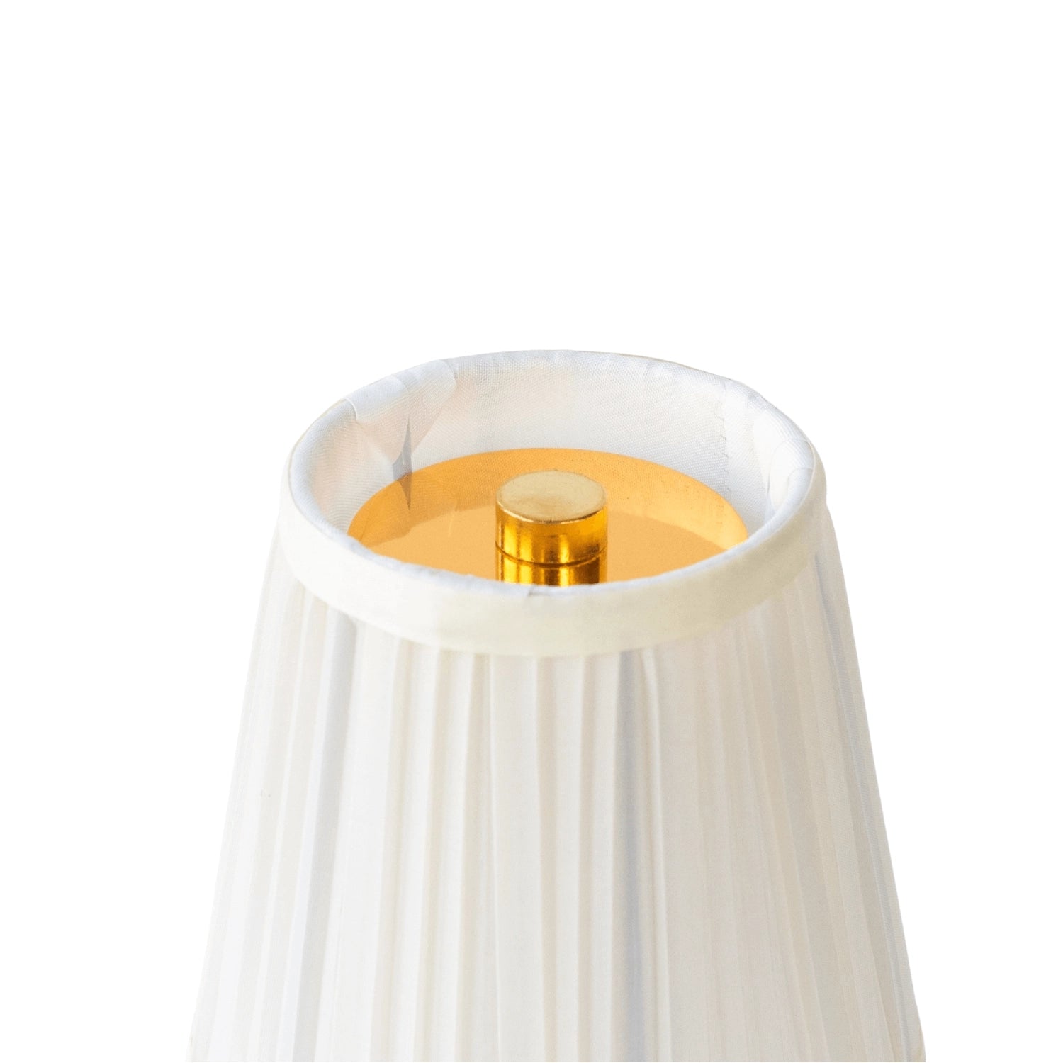 Elegant gold and brass designer table lamp with a rectangular base and cylindrical shade, featuring a luxurious amber glow, perfect for bedside lighting.