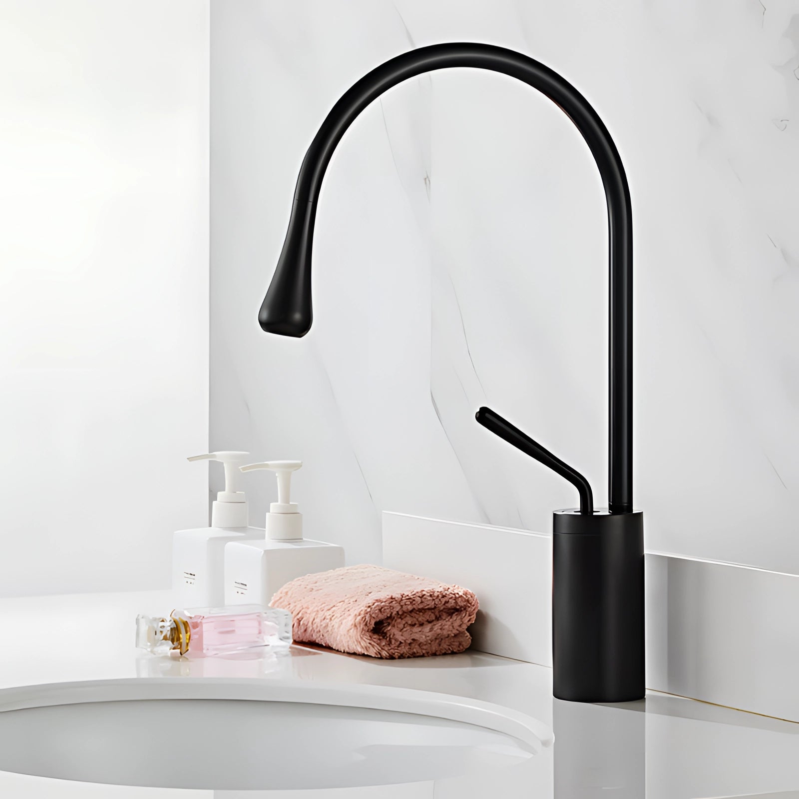 Luxurious black kitchen faucet with a high-arc spout, made of elegant brass, installed in a modern kitchen setting with wooden flooring and complementing decor elements.