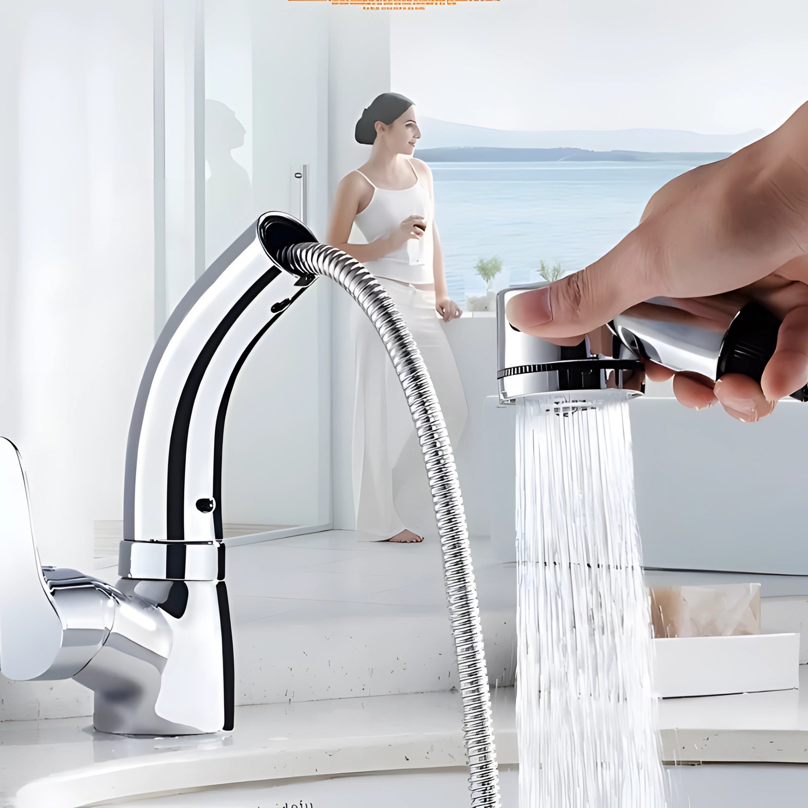 
A modern luxury gold kitchen faucet with a pull-out sprayer, installed and in use, showing water flow.