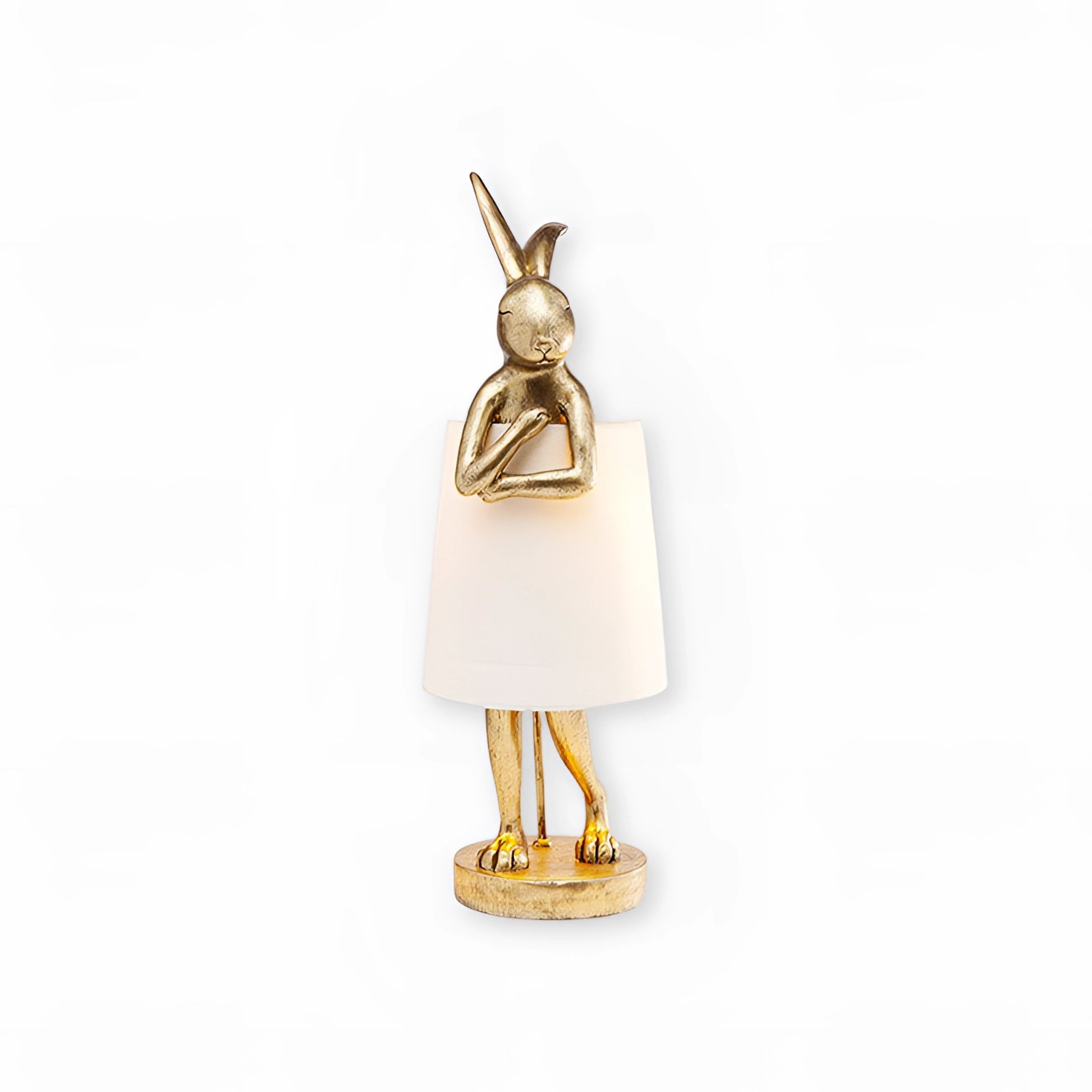 Gold rabbit-shaped lamp featuring a luxurious design, resembling a decorative bunny figurine, with metallic elements and a fashionable appearance, suitable as a unique light fixture and stylish ornament.