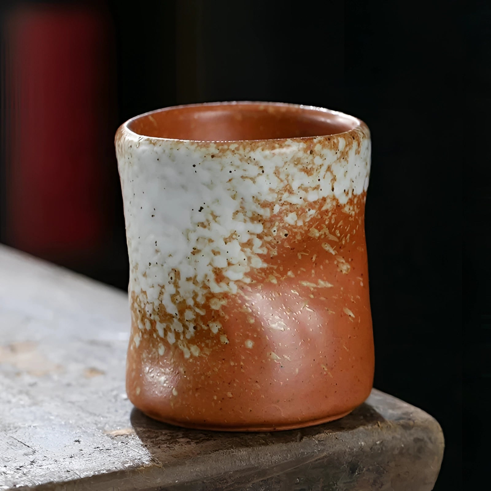 Handcrafted blue ceramic cup with a vintage style, featuring an orange tint, designed as a pottery tumbler with a 230ml capacity.