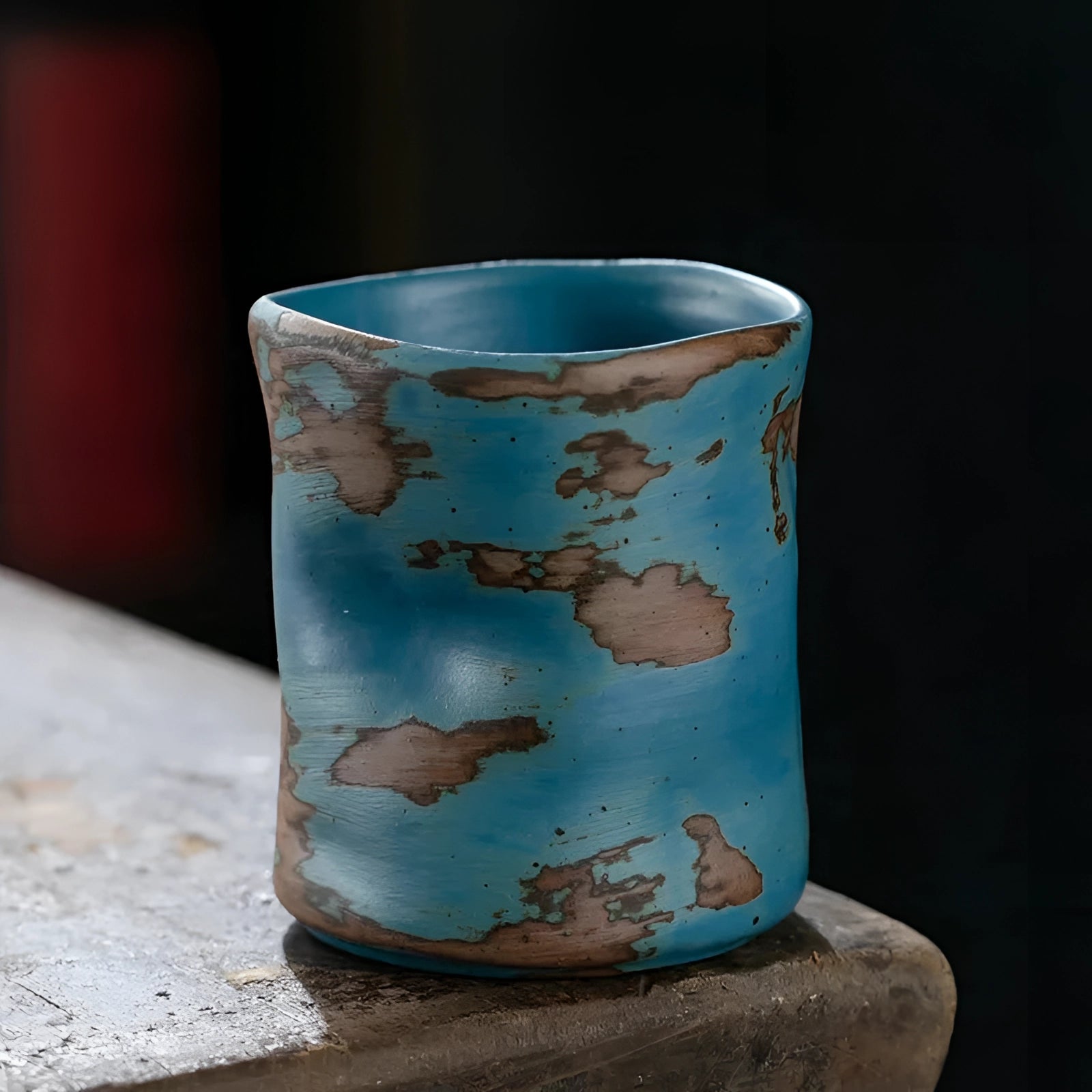 Handcrafted blue ceramic cup in a vintage style, featuring a cylindrical shape with a smooth paint finish, suitable for use as a drinkware tumbler with a capacity of 230ML.