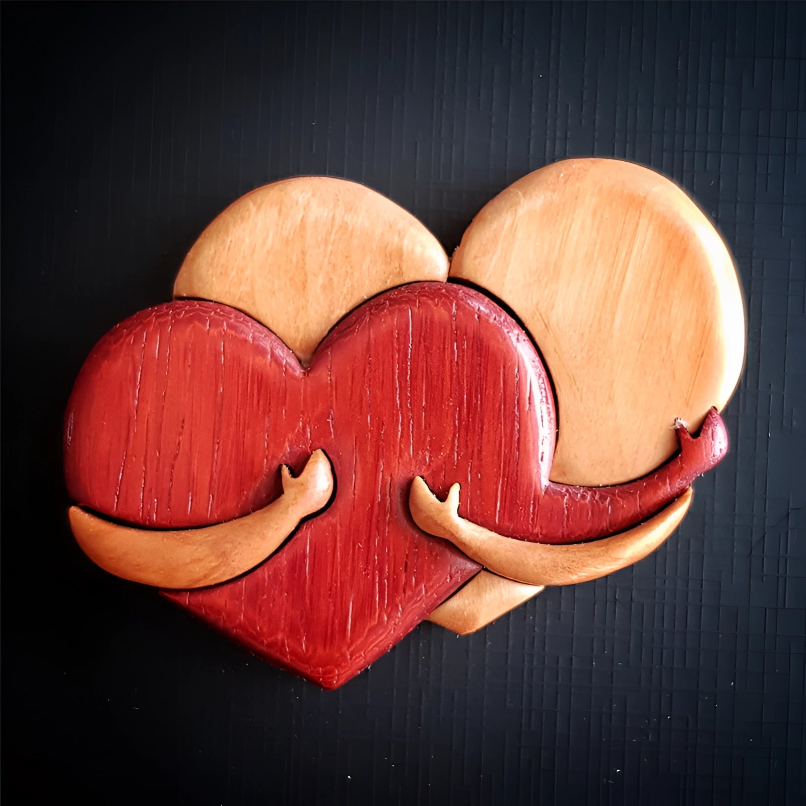 Handcrafted wooden heart puzzle held in a human hand, showcasing its smooth wooden texture and intricate design as a romantic gift and unique ornament.