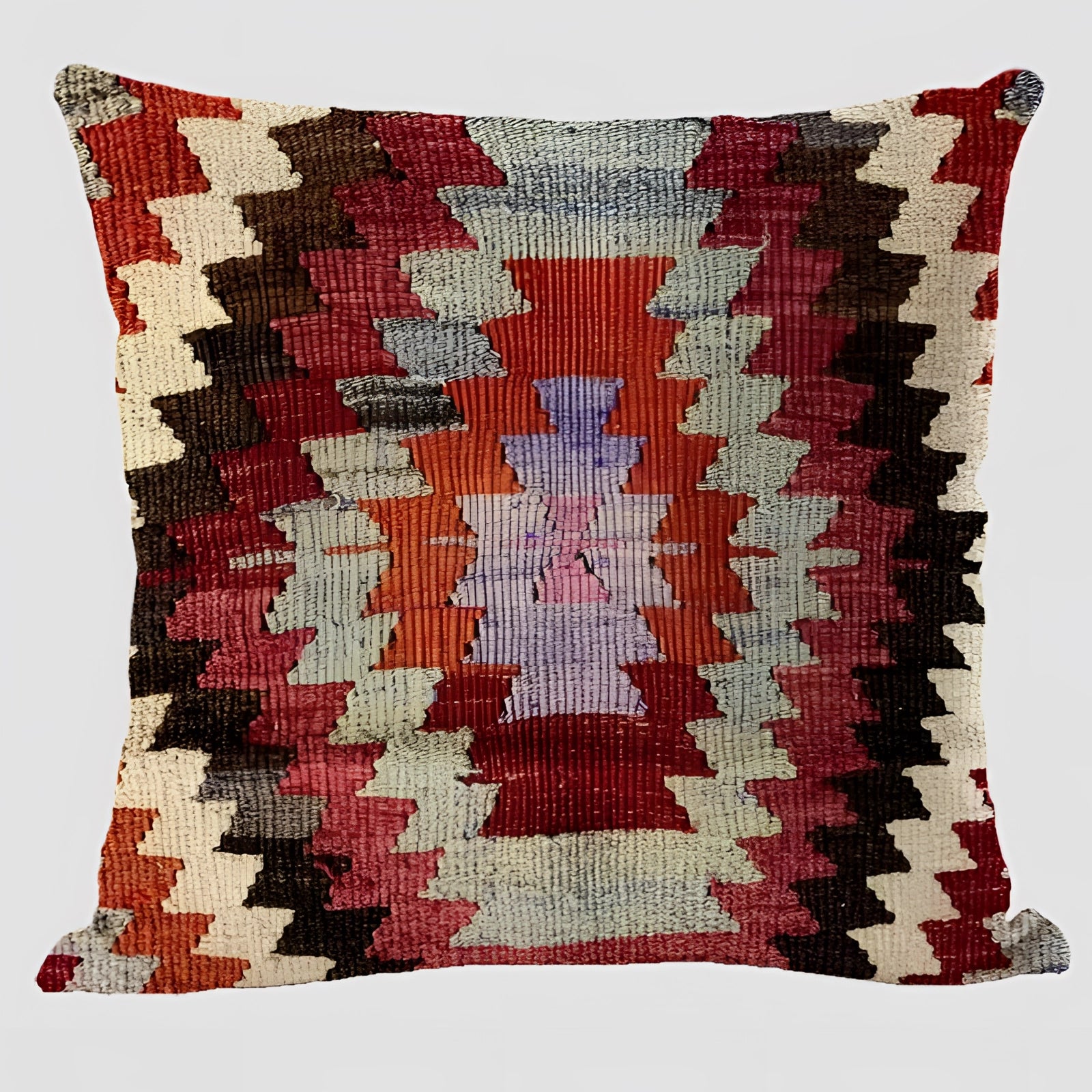 Handwoven Kilim cushion featuring an ethnic bohemian design with vibrant patterns and magenta accents, perfectly shaped in a rectangle to complement Southwestern decor.