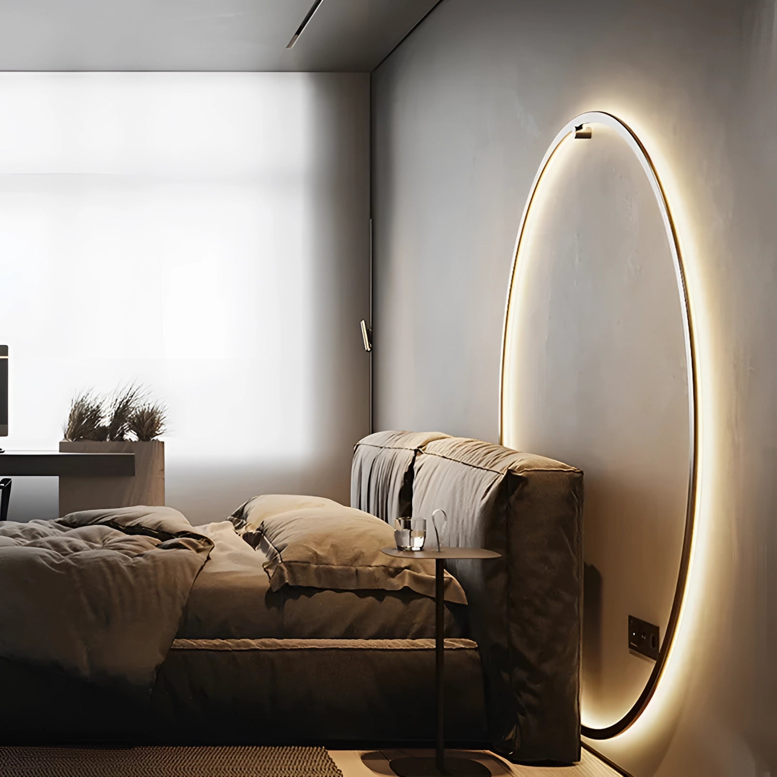 Large LED wall light mounted in a modern minimalist bedroom setting, featuring sleek design with warm ambient lighting. The room is elegantly furnished with wood flooring and contemporary interior design elements.