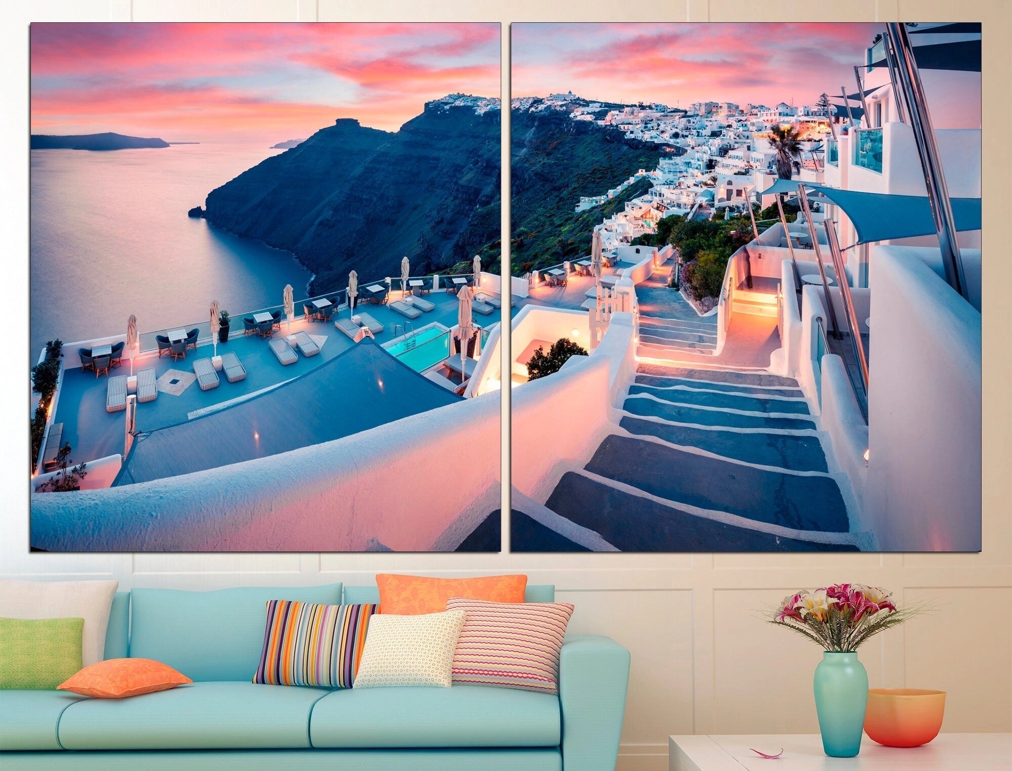 
Large Santorini canvas print featuring a stunning Greek architectural scene with vibrant blue and azure hues, displayed in two panels measuring 82"x47" (210x120cm). The artwork captures the essence of a sunny Mediterranean setting, with elements such as a building, outdoor furniture, and flowerpots, intended for wall décor art.