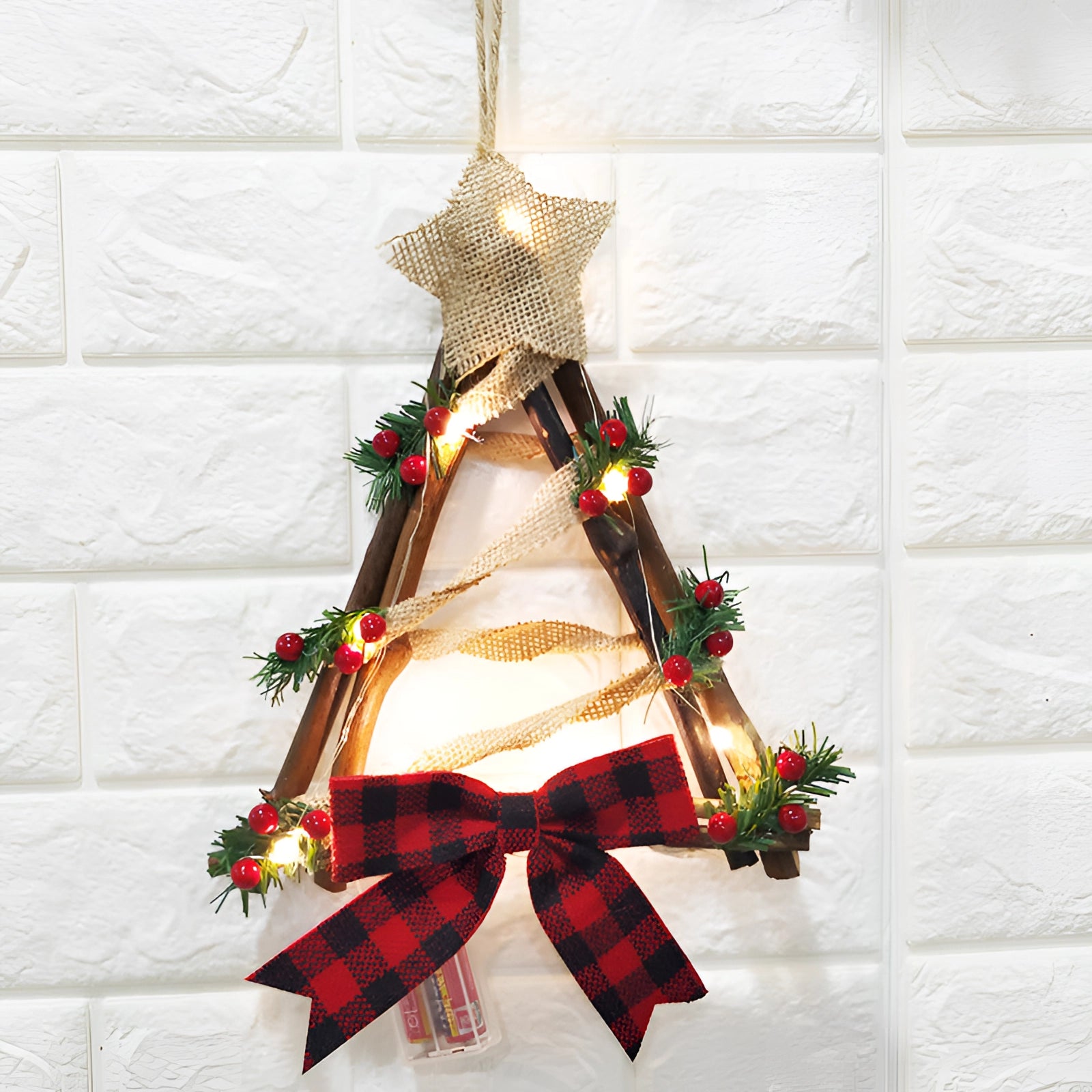 
Rustic LED Christmas tree lantern featuring a star on top, suitable for tabletop display or hanging, decorated as a holiday ornament.