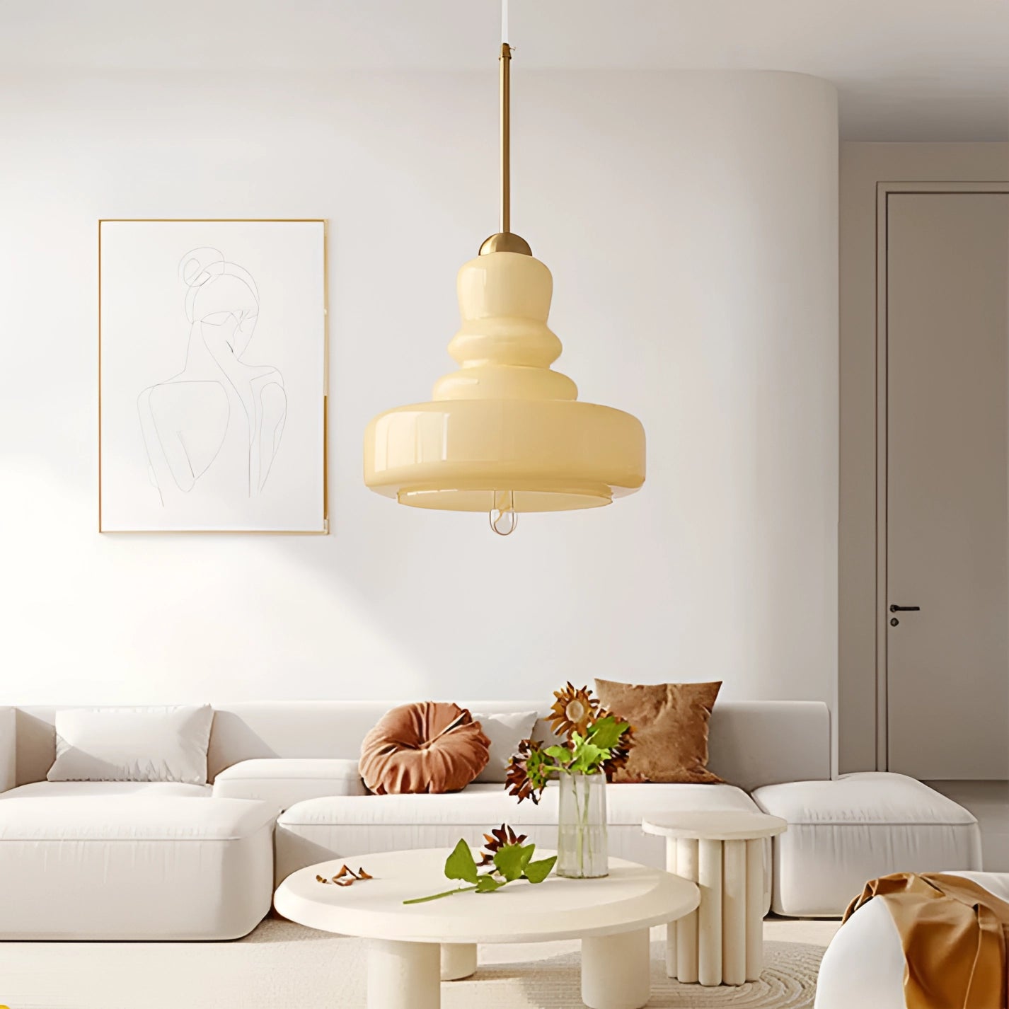 Lime green modern pendant light with a Scandinavian design, hanging in a stylish kitchen interior with beige couch, wooden table, and potted plant.