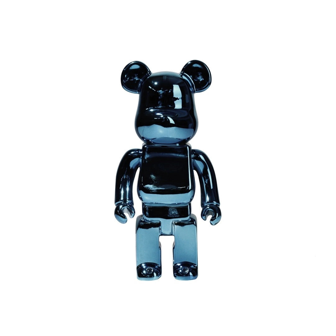 Limited Edition Clear Vinyl Bearbrick designer art toy figurine in electric blue, featuring a bear-shaped form with a clear vinyl body and intricate detailing.