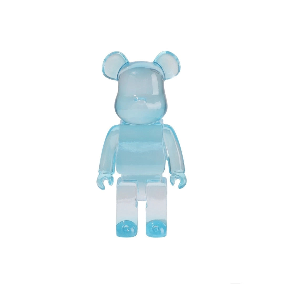 Clear blue limited edition vinyl Bearbrick art toy figurine with a transparent design, showcasing intricate details and designer aesthetics.