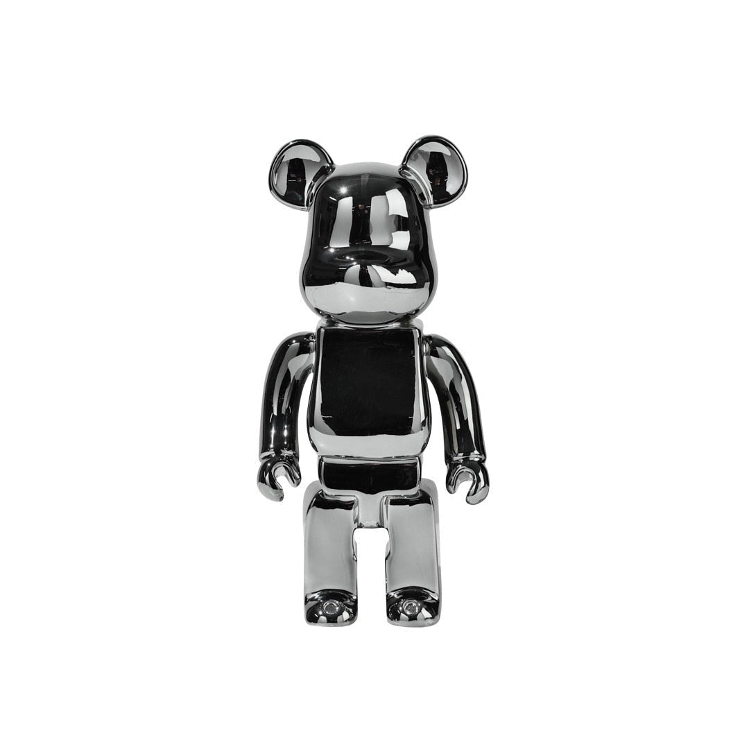 Limited Edition Clear Vinyl Bearbrick Designer Art Toy Figurine in Light Black, featuring a sleek and glossy finish with distinct designer details, resembling a fictional character action figure.