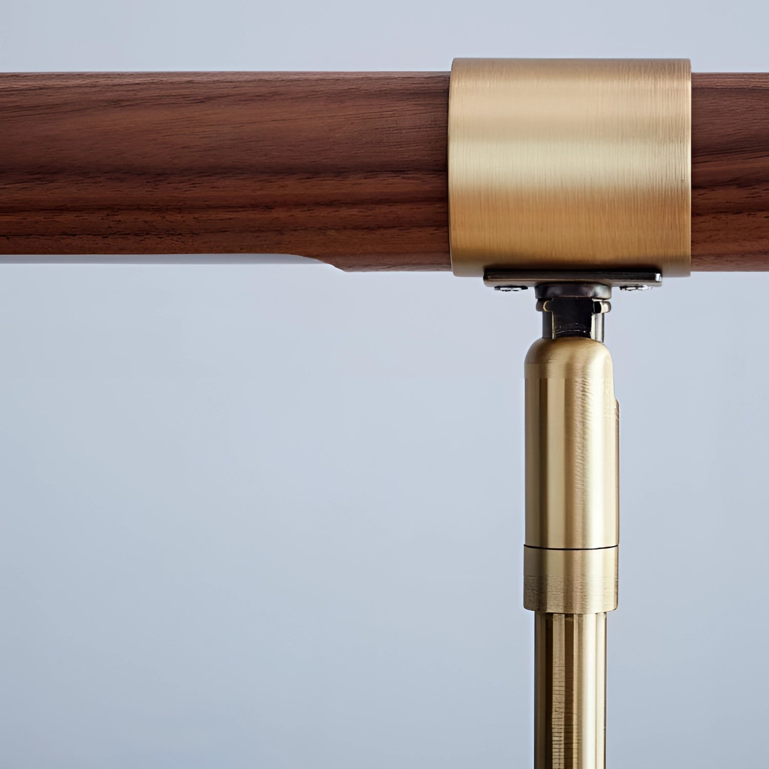 Luxury Brass and Wood Adjustable Desk Lamp with Modern Office Lighting Design, featuring a rectangular wooden base, cylindrical brass elements, and a sleek light fixture.