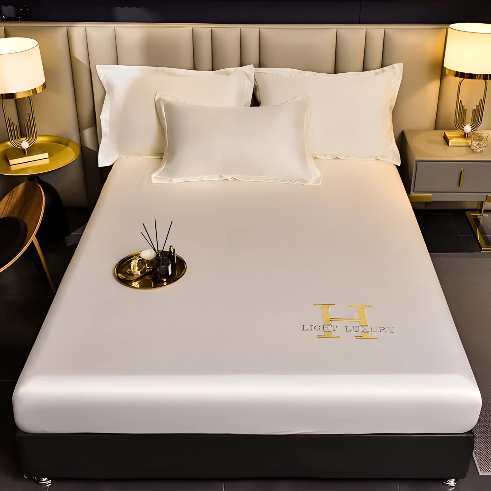 Luxurious white silk bedding set on a neatly made bed, featuring premium satin sheets and pillowcases in a spacious, well-lit bedroom with modern interior design elements.