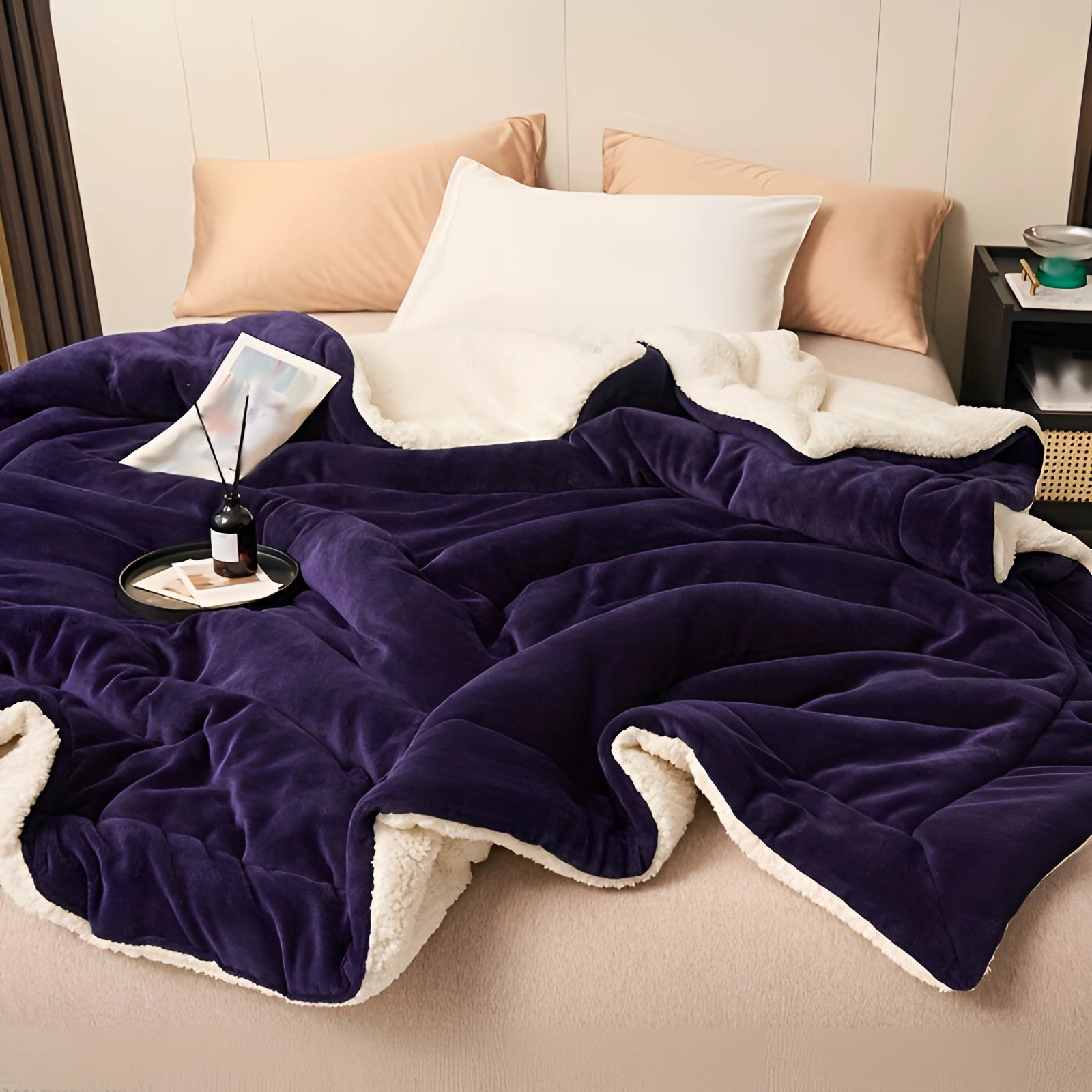 Luxury deep purple velvet blanket with plush sherpa lining, showcasing a rich and cozy texture, ideal for adding comfort and elegance to any setting.