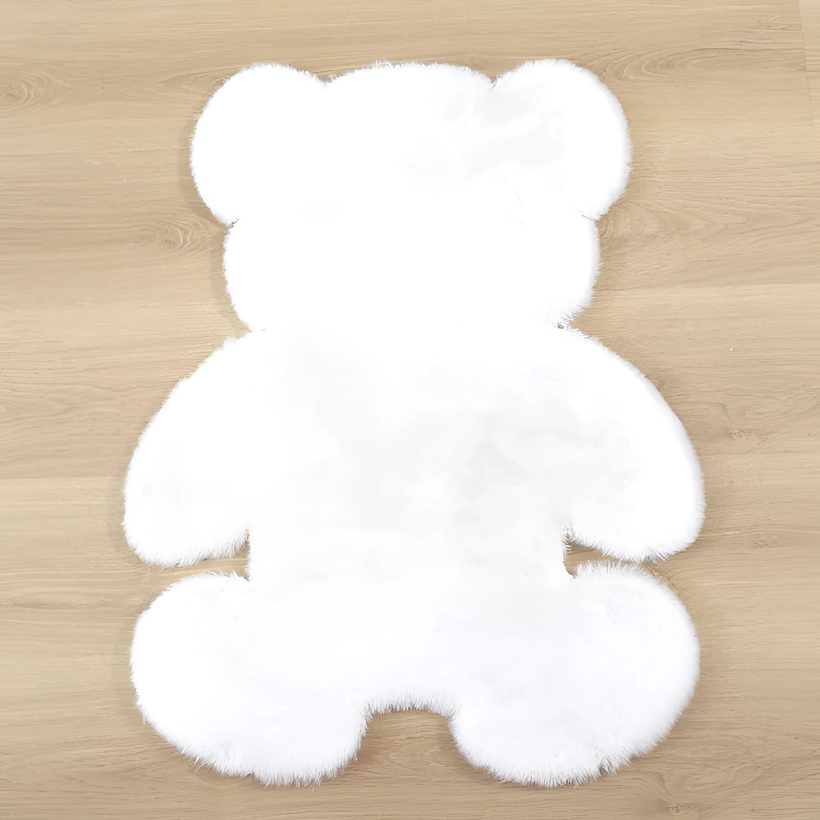 Plush white faux fur blanket styled with a teddy bear theme, measuring 90x120cm, with a soft and luxurious texture perfect for winter warmth and home decor.