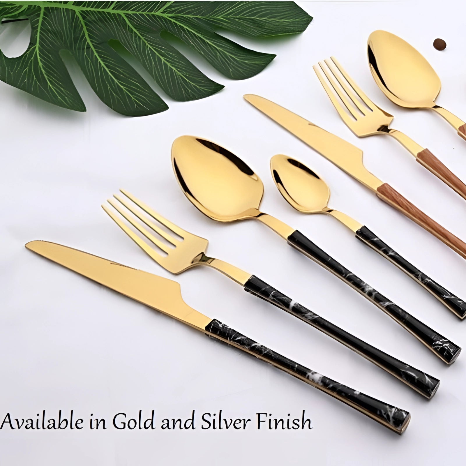 Luxury gold marble handle cutlery set featuring elegant flatware with sleek, designer handles.