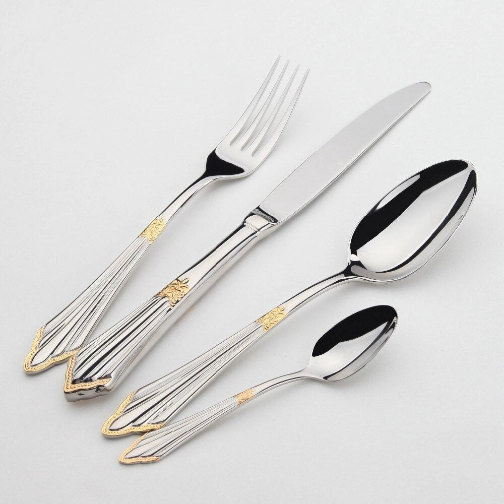 Elegant 48-piece luxury gold and silver cutlery set featuring forks, knives, and spoons, displayed in an organized arrangement suitable for weddings or special events, showcasing polished metallic finishes and sophisticated design on a rectangular table setting.