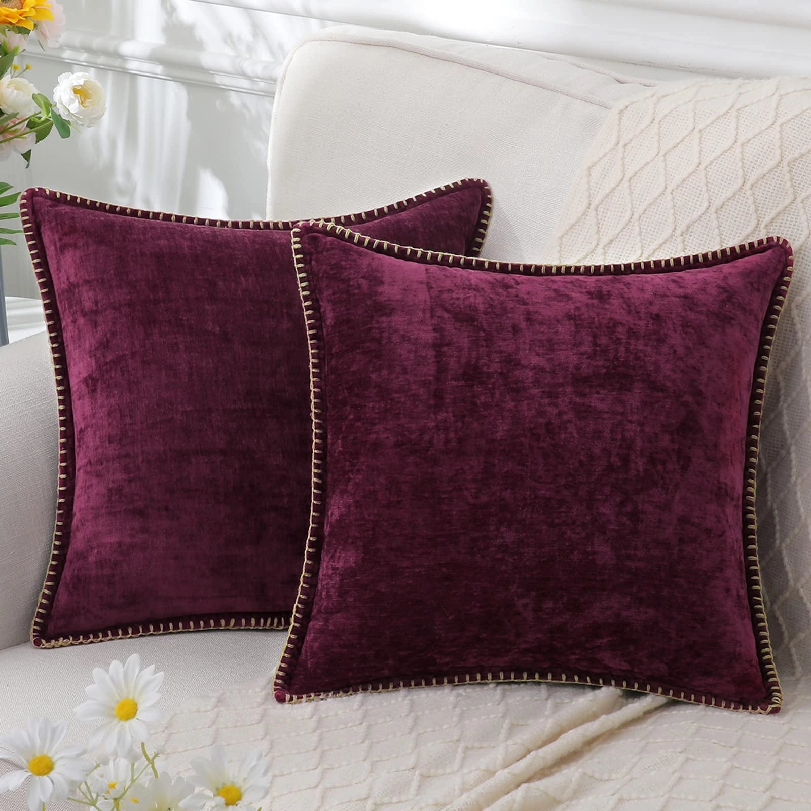 Luxury grey velvet throw pillows in a set of four, featuring an elegant violet hue with a subtle floral pattern, offering a soft and comfortable addition to home decor.