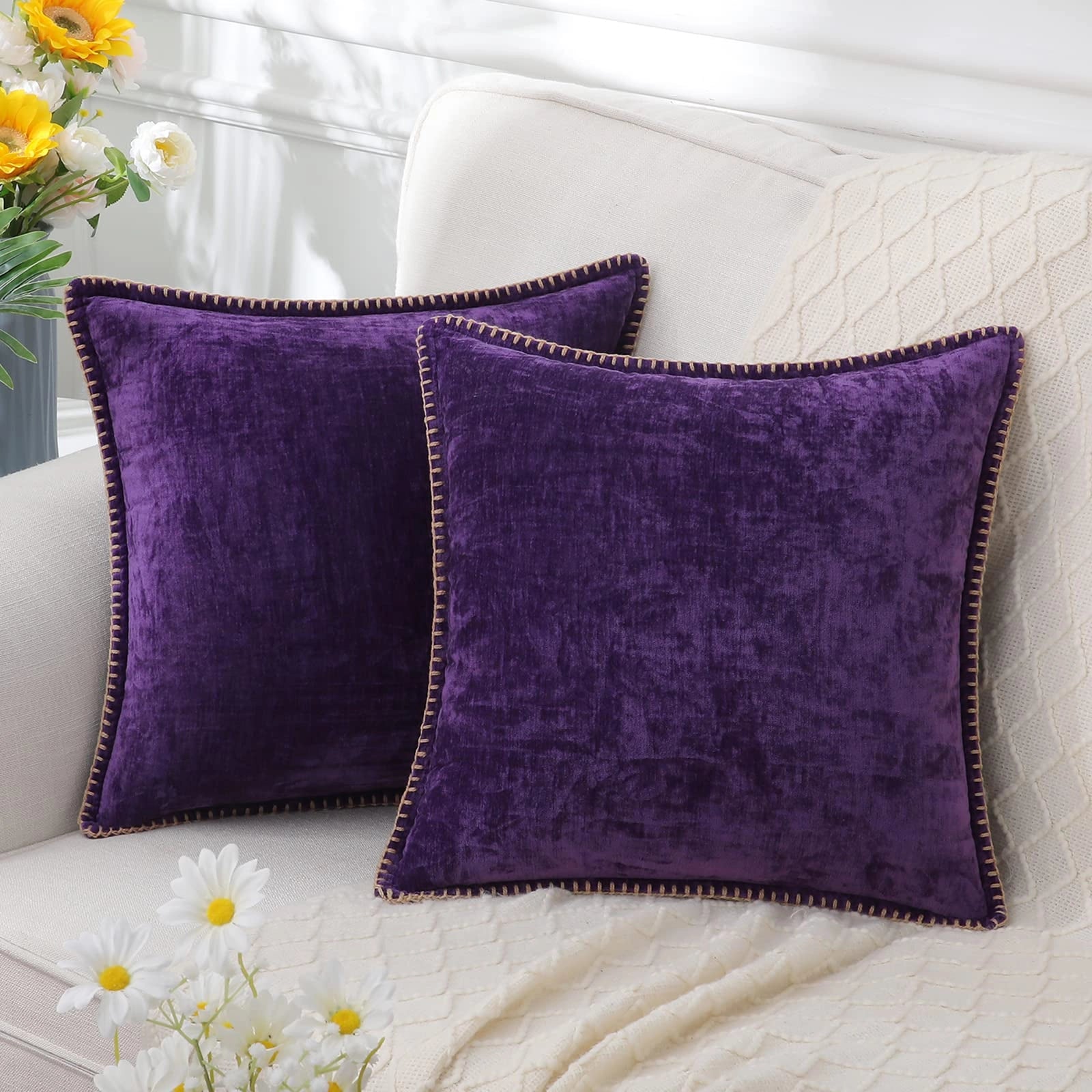 Luxury grey velvet throw pillows in a set of four, featuring elegant soft decor cushions in shades of purple with floral and plant motifs, providing a comfortable and stylish addition to any room.