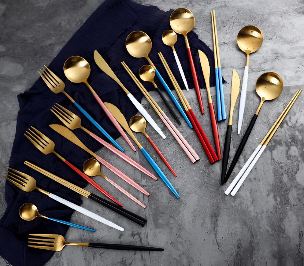 Luxurious metallic finish cutlery set with sleek, stylish design displayed against a well-lit background highlighting its durability and elegance.