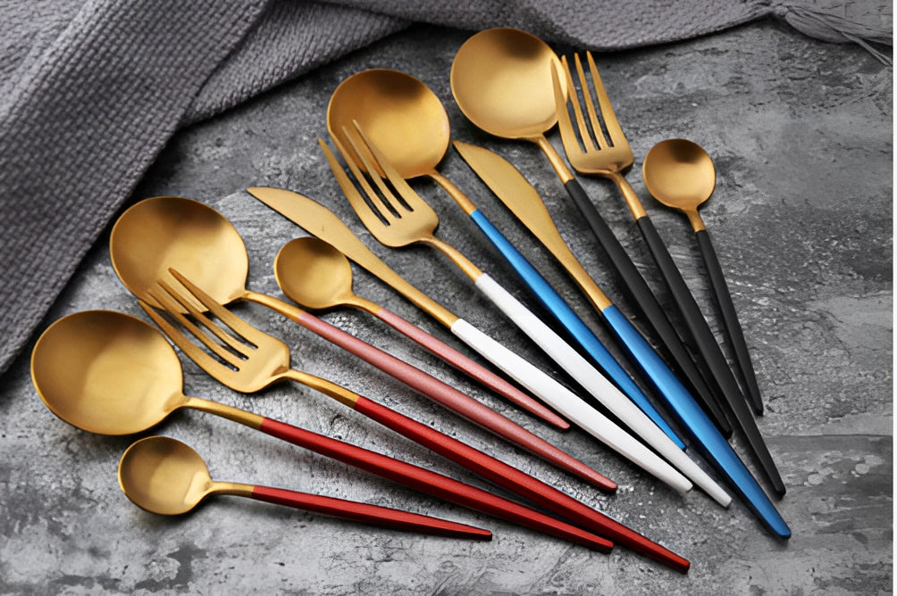 Luxury metallic finish cutlery set featuring a spoon and fork, elegantly designed for stylish and durable dining experiences.