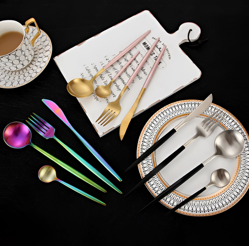 Luxury metallic finish cutlery set featuring a stylish and durable design, elegantly displayed alongside complementary tableware and serveware on a dining table setting.