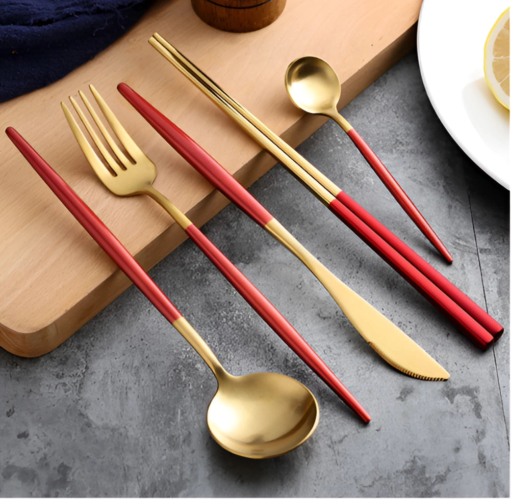 Luxurious metallic finish cutlery set displayed on a wooden surface, featuring stylish and durable utensils perfect for dining, with a focus on the shiny yellowish tones of the cutlery pieces.