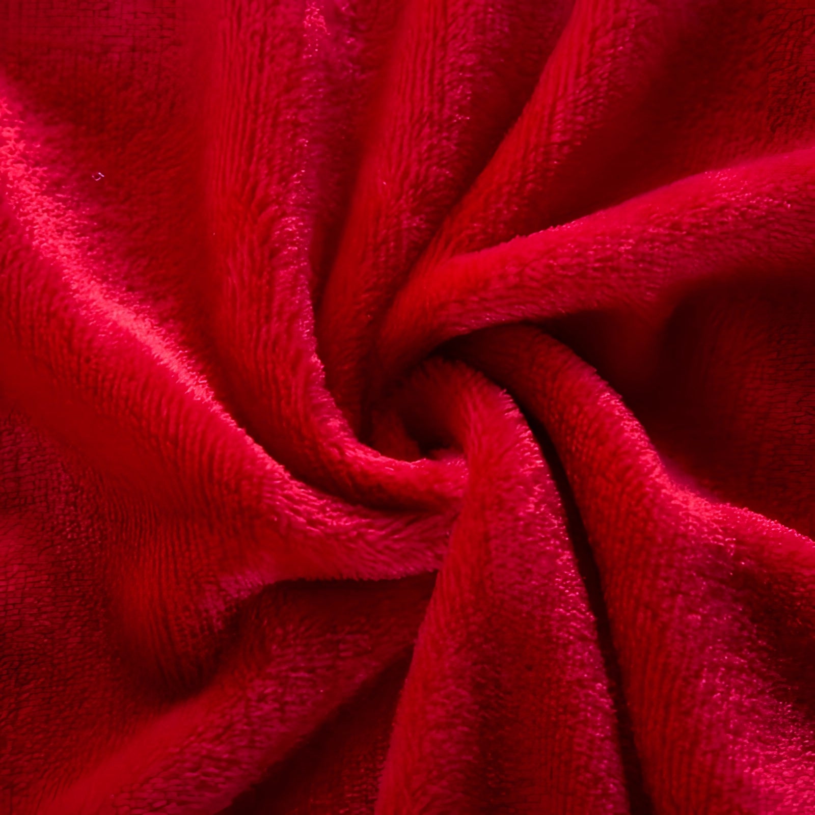 Luxurious red velvet blanket with a soft, premium texture, featuring a pattern reminiscent of pink and magenta garden roses.