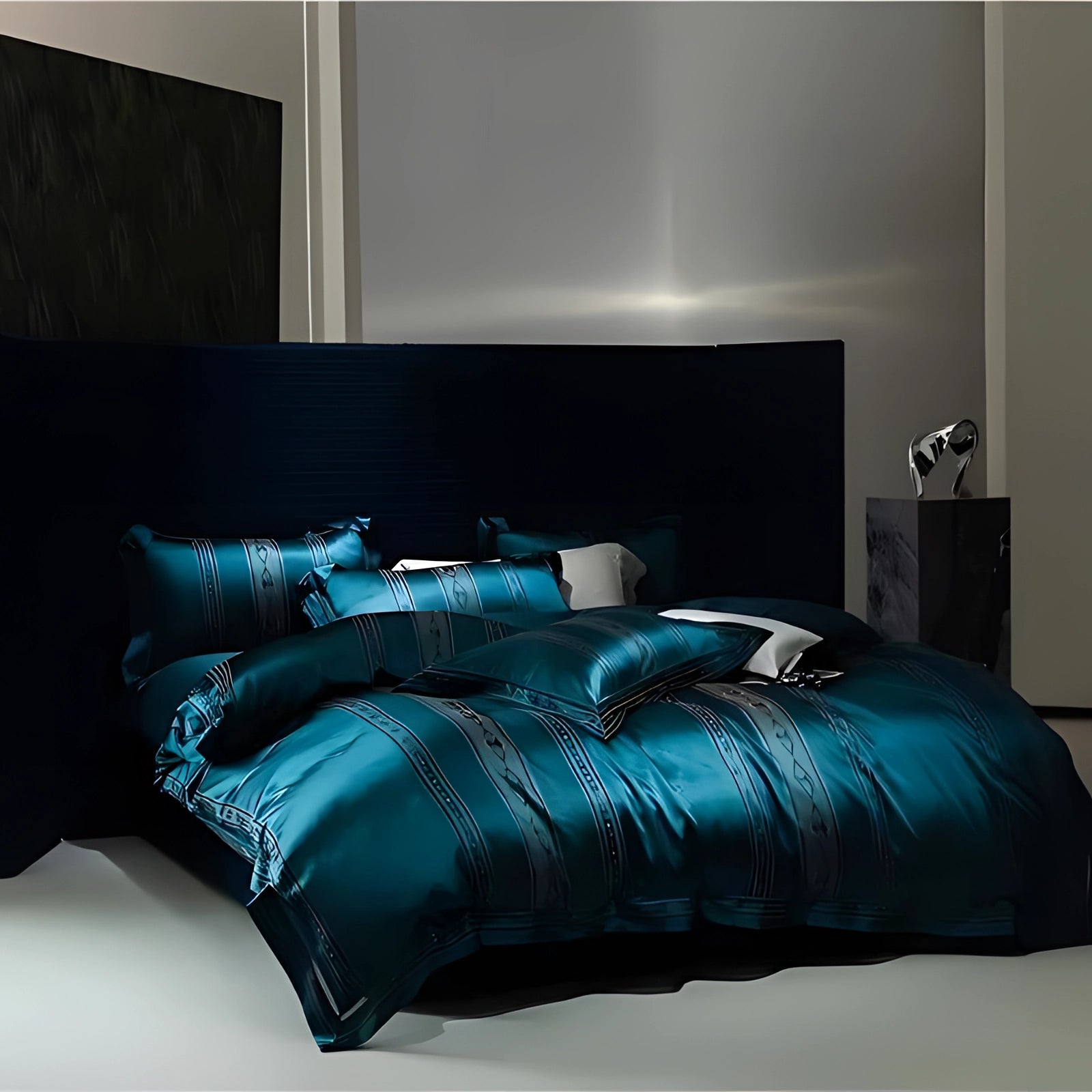 Luxury teal silk bedding set featuring a satin duvet and designer pillowcases elegantly arranged on a stylish bed frame in a beautifully designed interior setting.