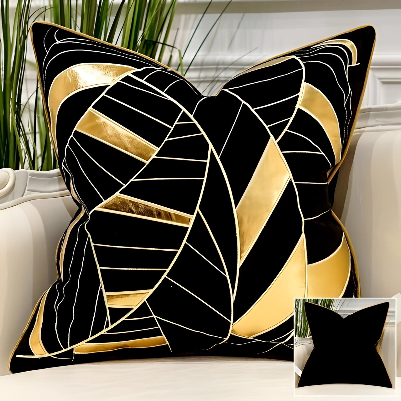 Luxurious black velvet throw pillow with a gold geometric abstract design, measuring 18 inches by 18 inches, suitable for elegant home decor.