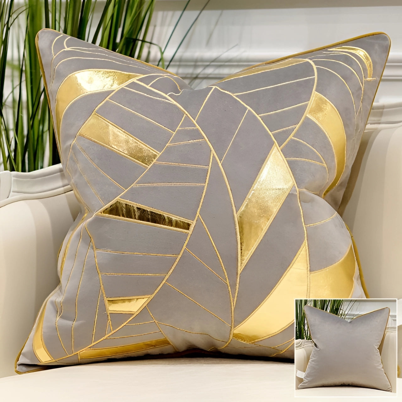 Luxury velvet throw pillows in gray with gold accent geometric abstract design, measuring 18" x 18", placed on a couch in an interior setting with decorative plants.