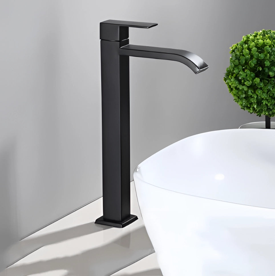 Matte black modern square bathroom faucet with a sleek minimalist design, installed on a rectangular sink.