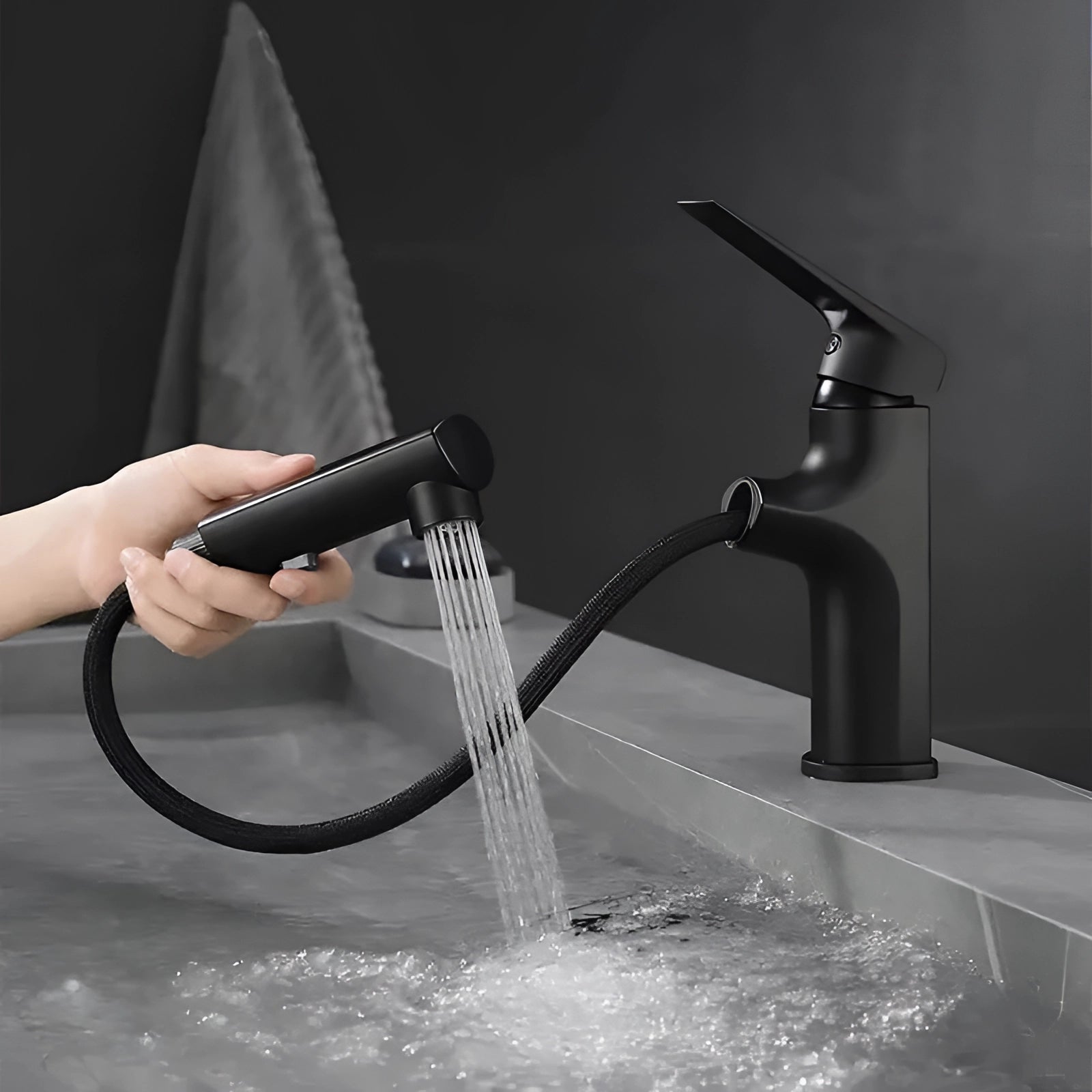 Matte black single-handle bathroom faucet installed on a countertop, designed with a modern aesthetic and water-efficient features.