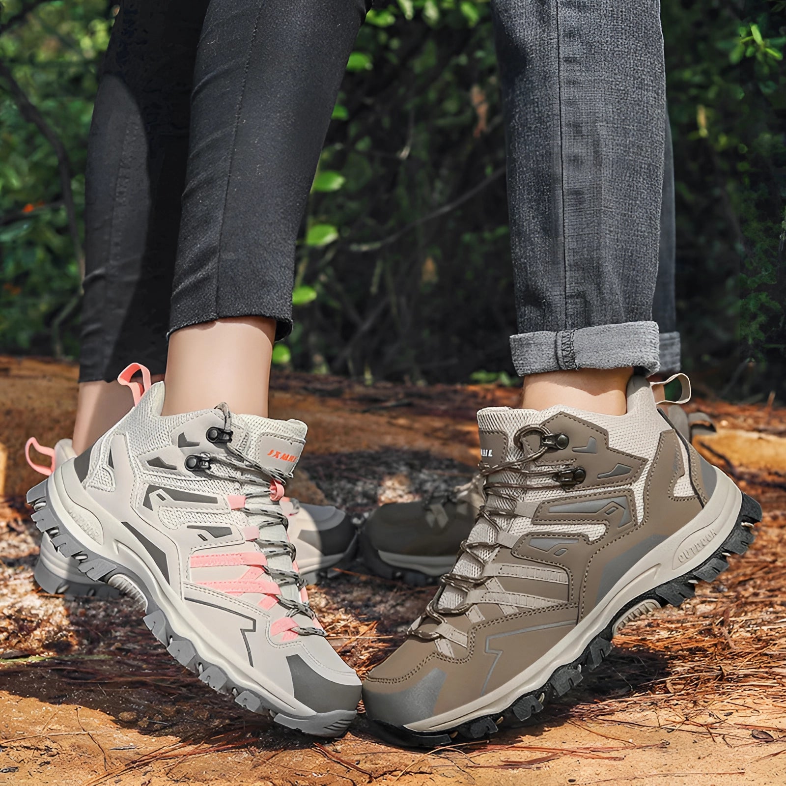 Men's waterproof lightweight hiking boots designed for multi-terrain use, shown on a person walking in nature with grass visible in the background.