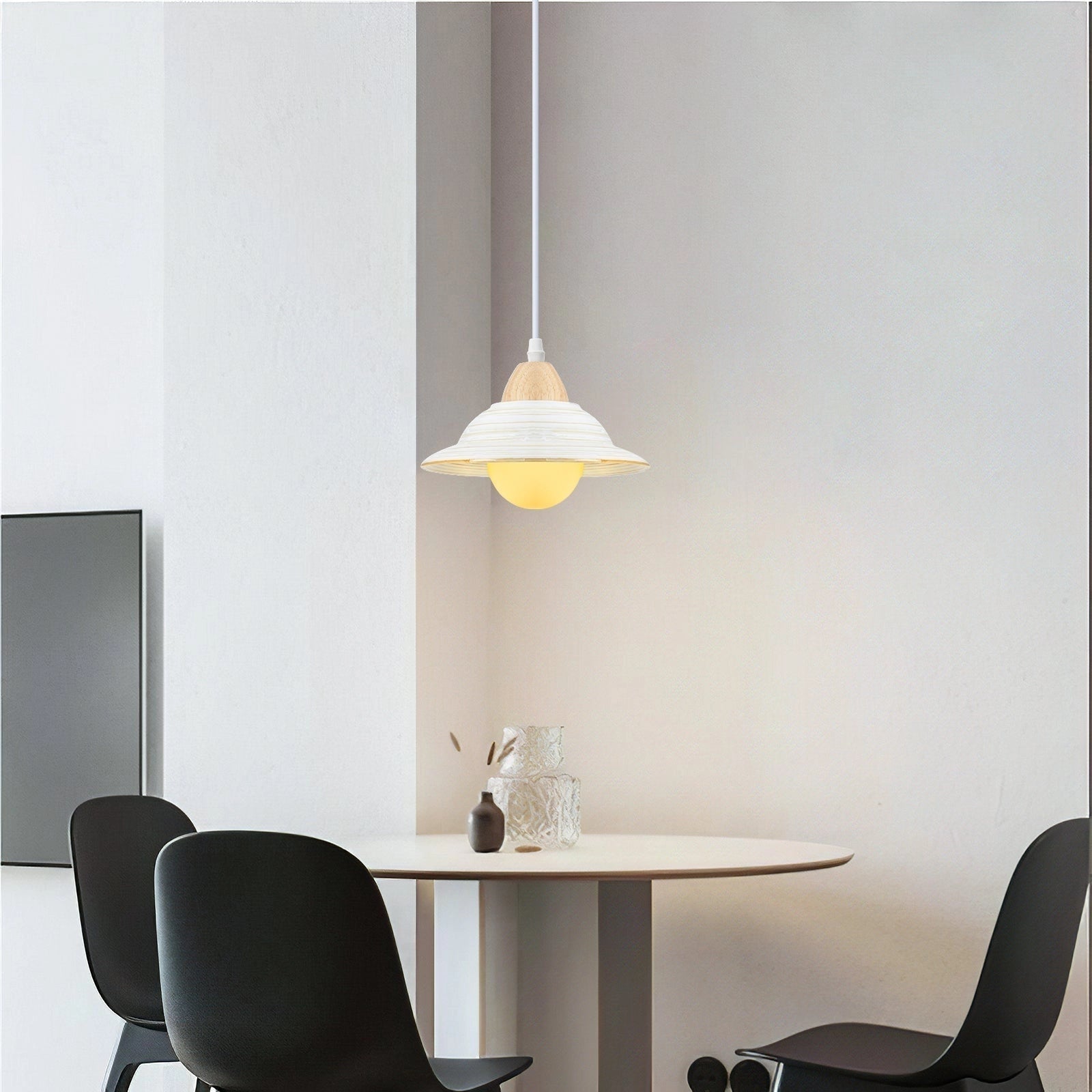 Minimalist Scandinavian Wooden Pendant Light hanging above a Nordic dining table, with modern furniture and interior design elements.