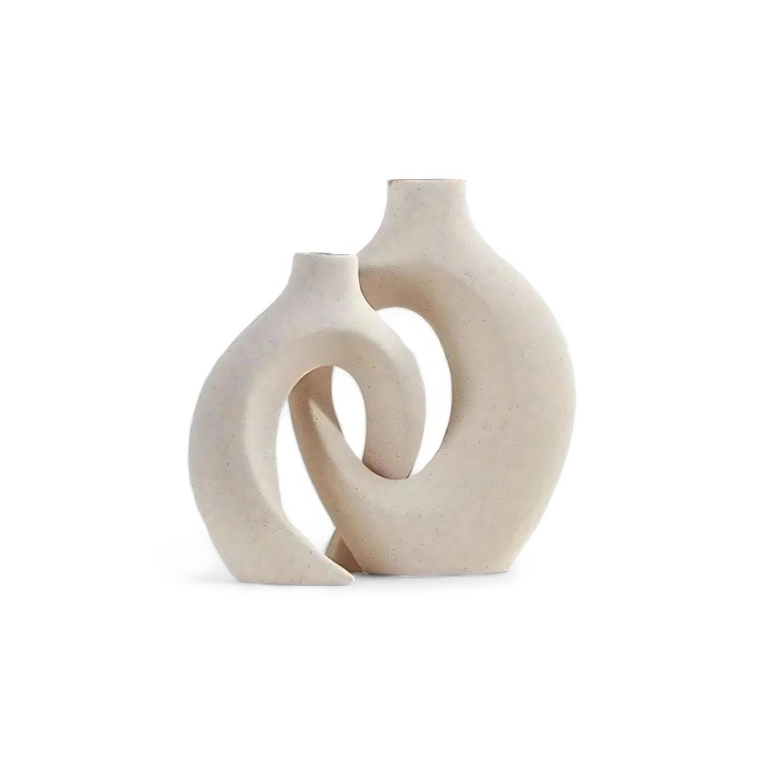 Modern abstract ceramic vase with bohemian design, featuring sleek lines and a glossy finish, suitable for contemporary home decor.