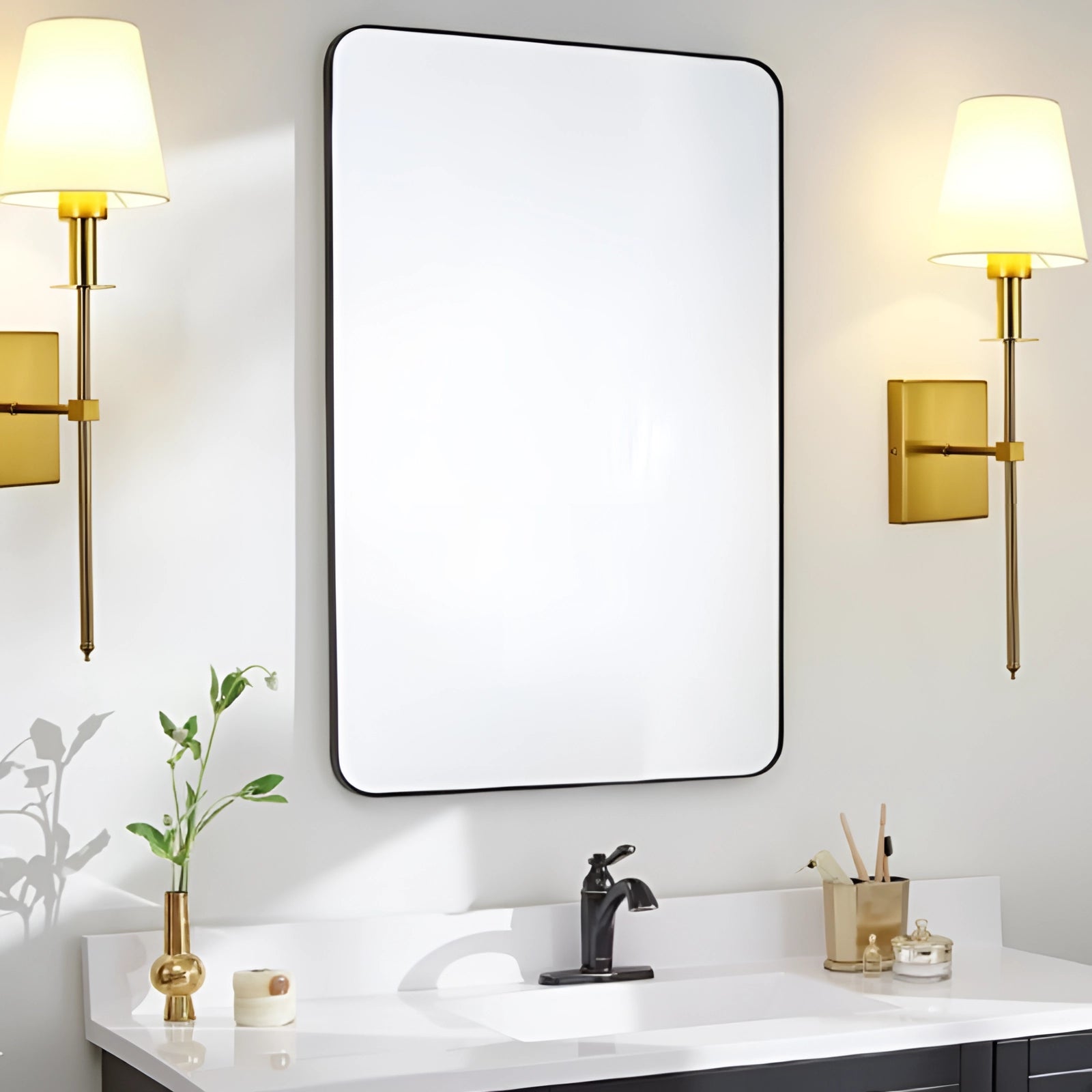 Modern black adjustable wall sconce mounted above a bathroom sink, illuminating a minimalist interior design with a rectangular mirror and window, complemented by indoor plants.