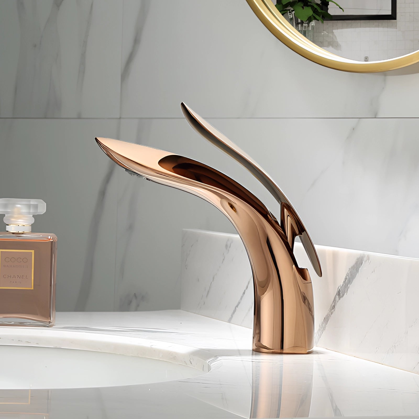 
A rose gold modern black designer kitchen faucet with a luxury minimalist design, displayed in a stylish kitchen setting.