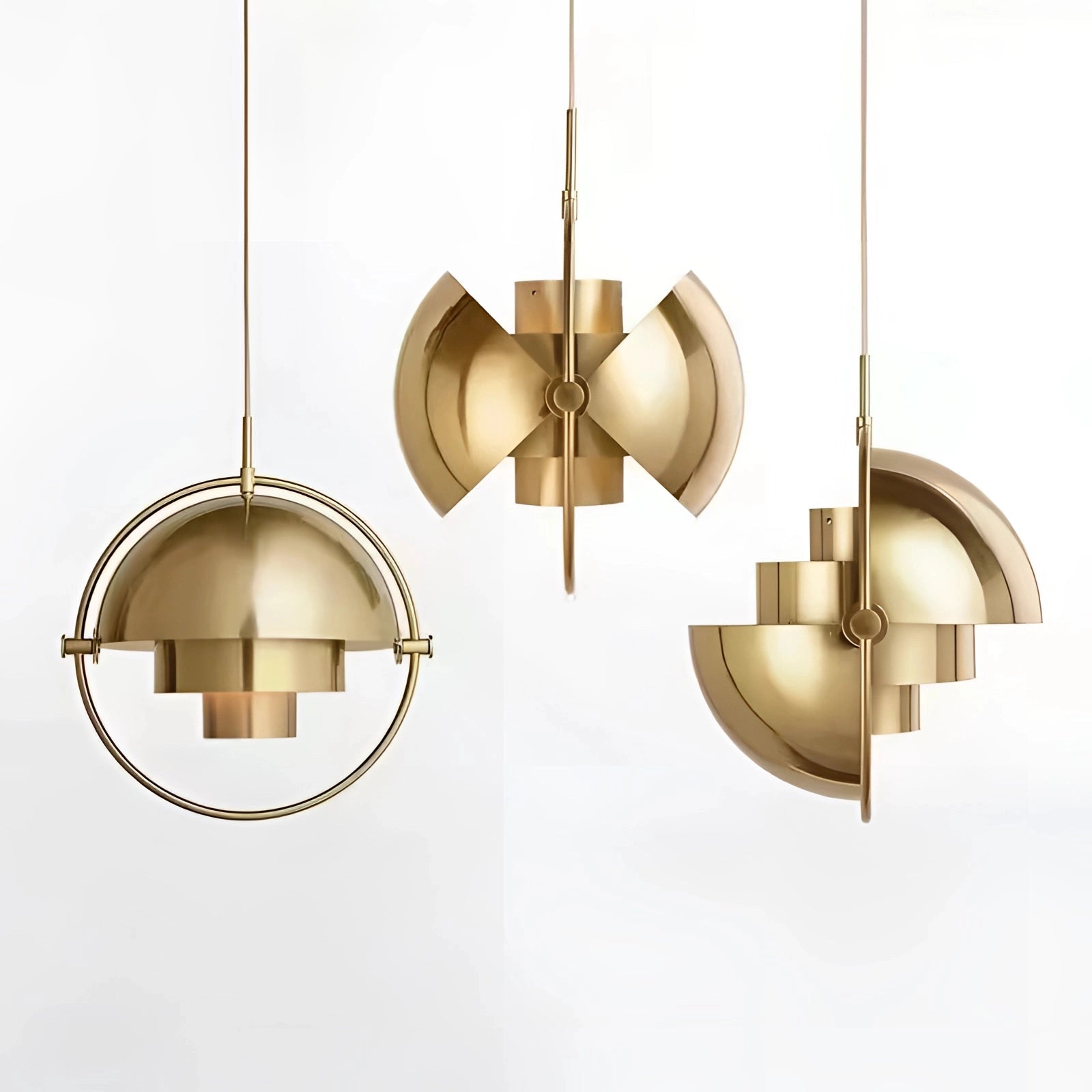 Modern brass finish pendant light with minimalist Scandinavian design, featuring a circular metal structure and symmetrical ceiling fixture.