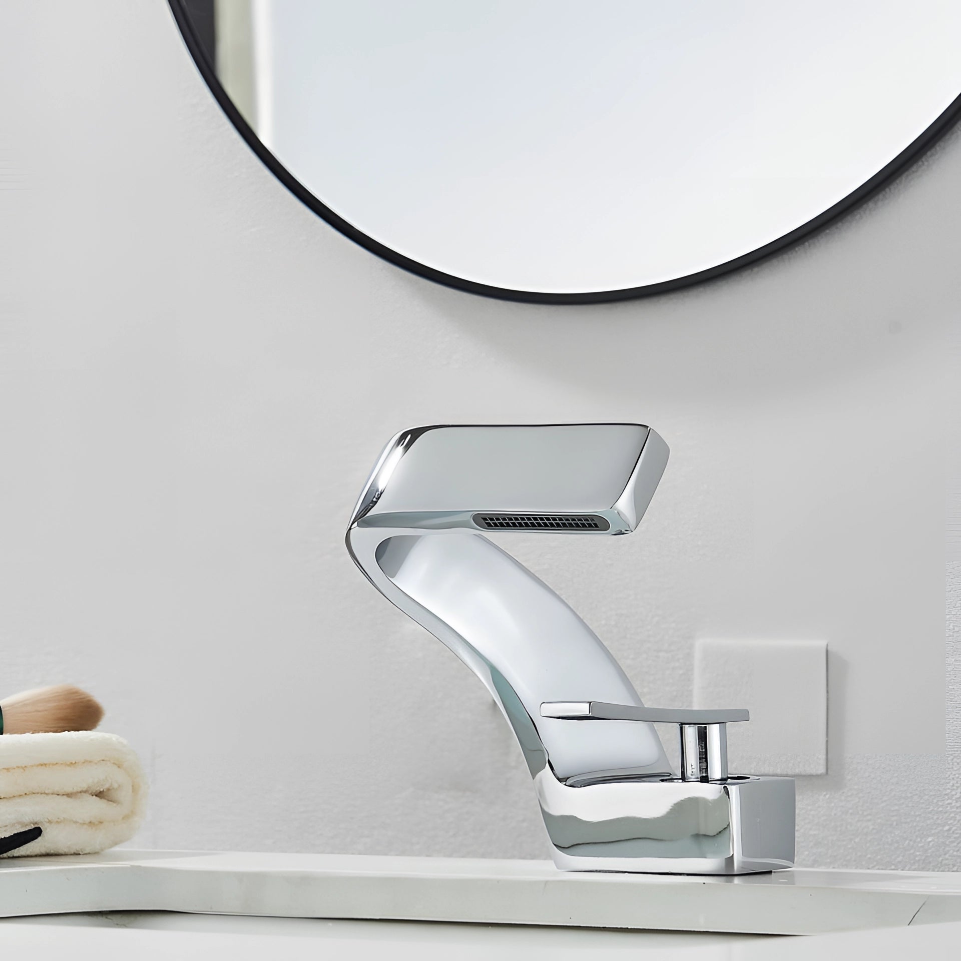 Sleek chrome waterfall faucet with a luxury square spout design, suitable for modern bathroom basins. The faucet features a polished metal finish and contemporary rectangular lines.